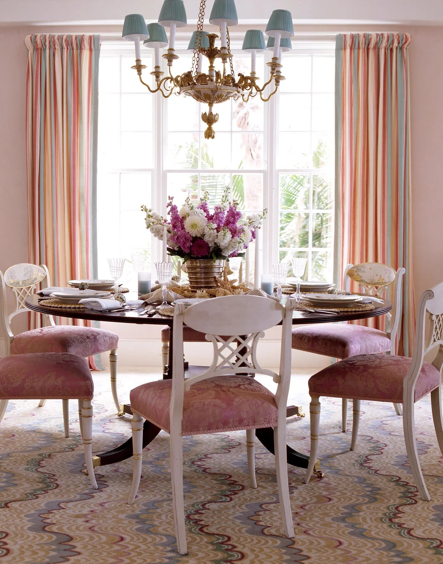 Dining Room - 
Regency painted dining chairs under an Italian gilded chandelier