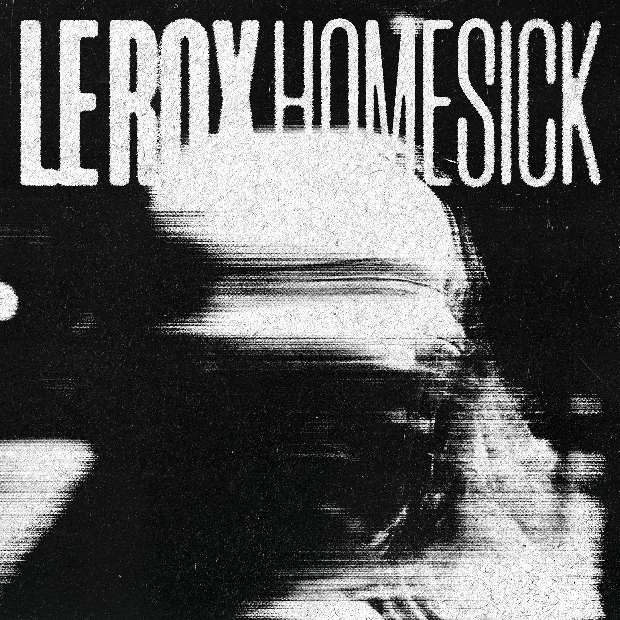 The image features a grainy, black-and-white, distorted photograph of a person with long hair, with the text 'HERX HOLMESICK' above them. The overall effect is glitchy and abstract.