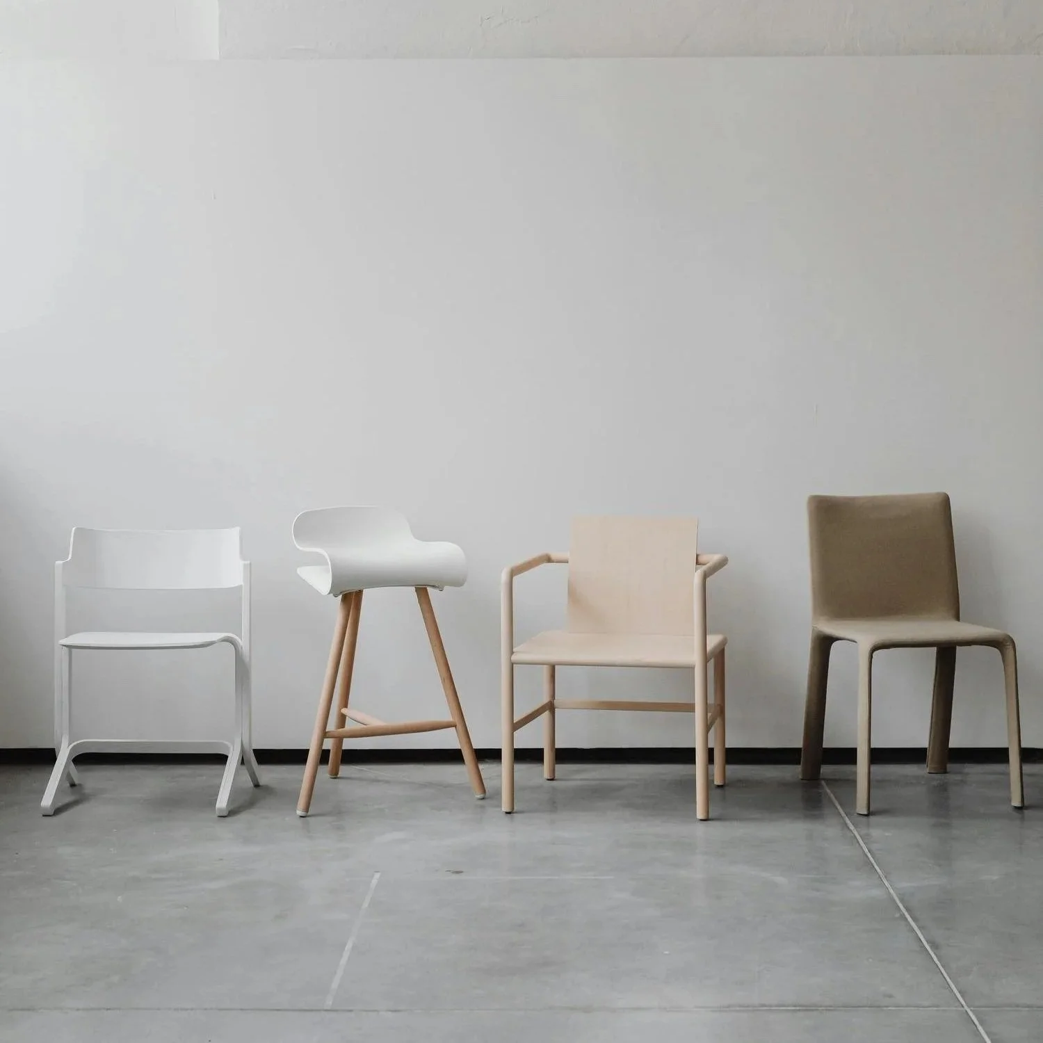 Set of modern chairs in contemporary photo studio
