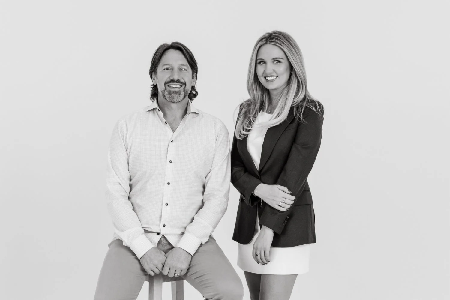 Two mortgage brokers in a studio in phoenix az