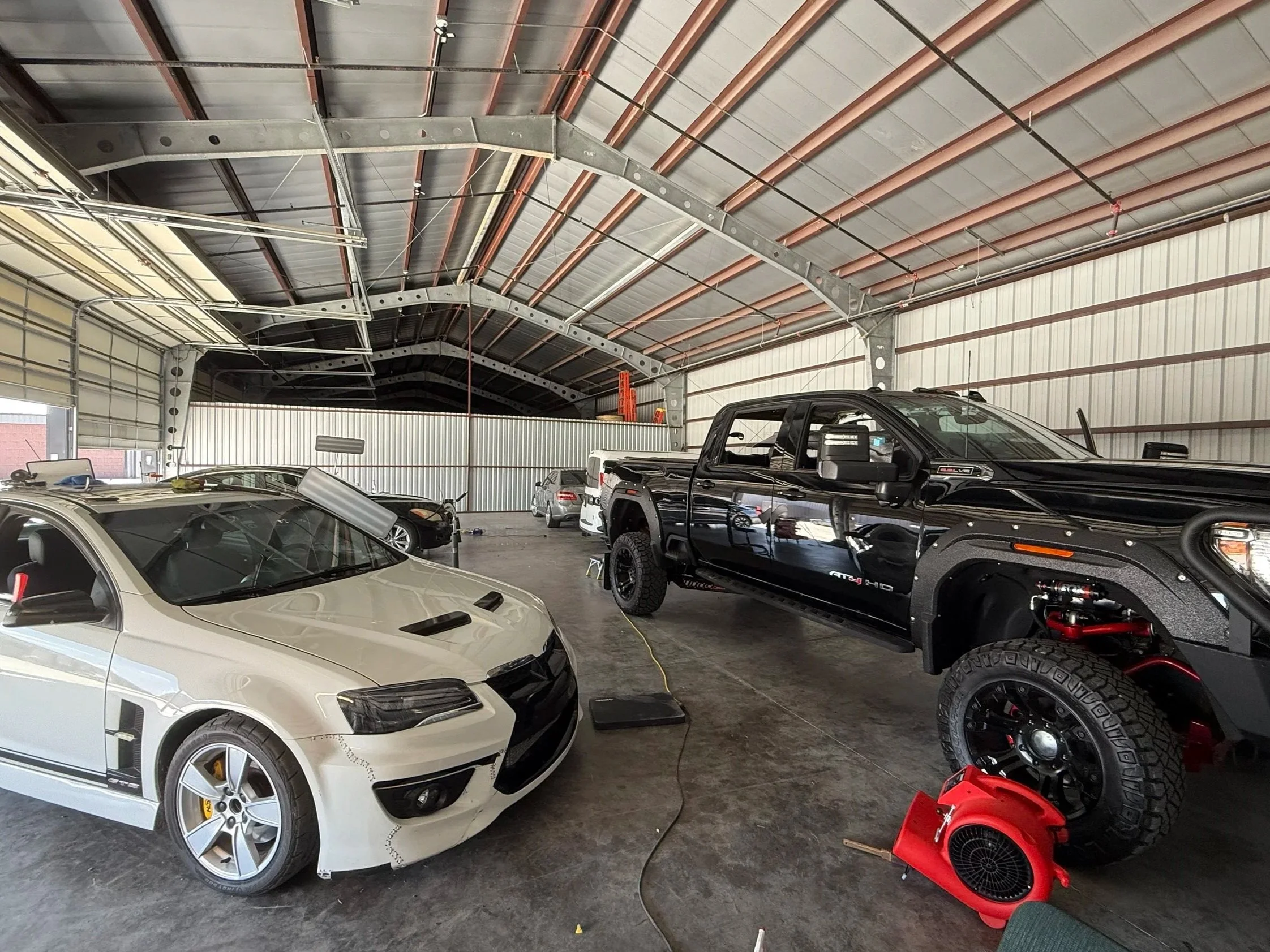 This is shop location of Hail Bent Auto Hail Repair in Texas