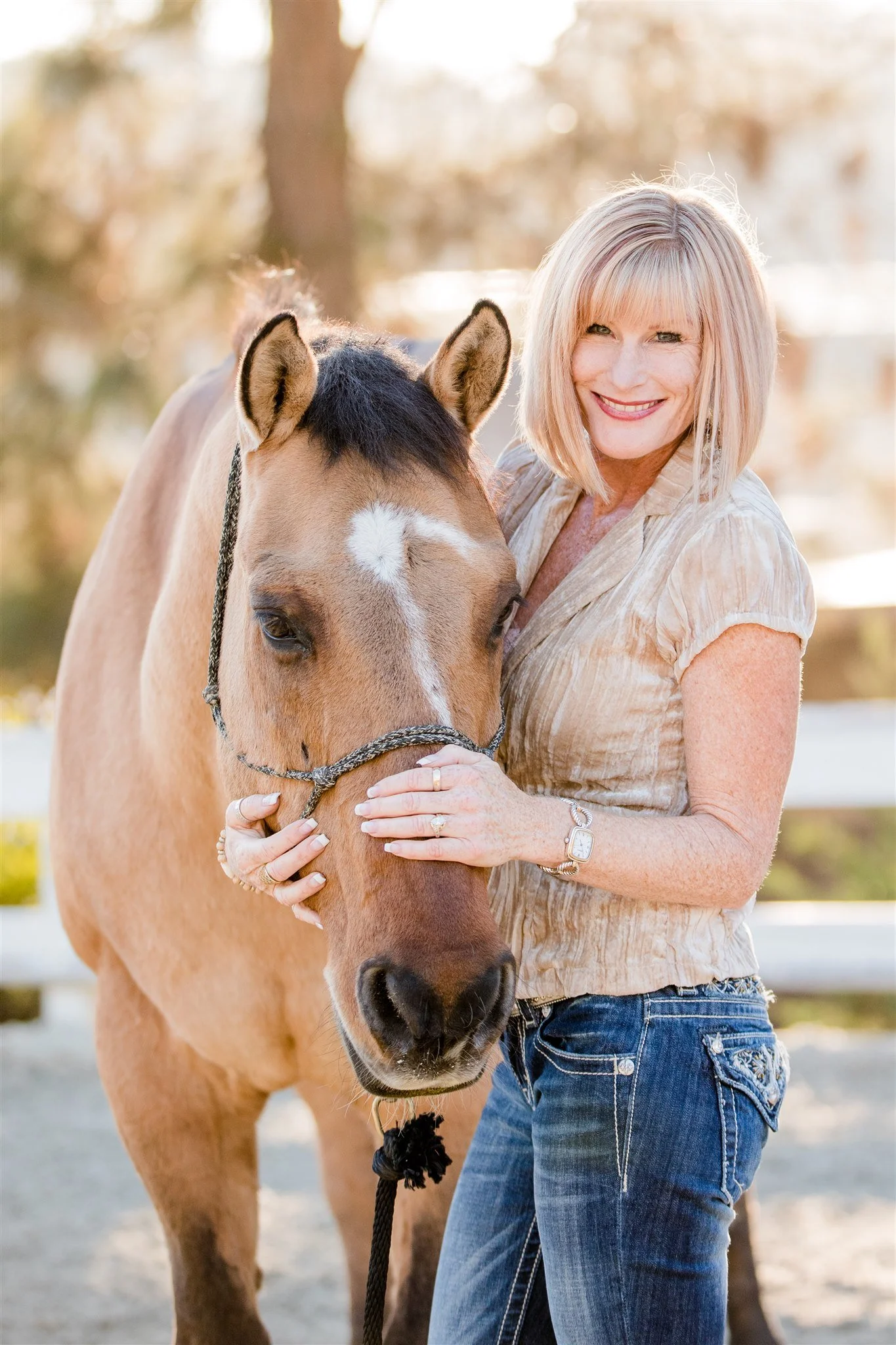 Michelle, the founder, holding the founding equine coach, Chief Copy