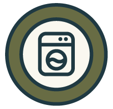 Icon of a washing machine inside a circular emblem.