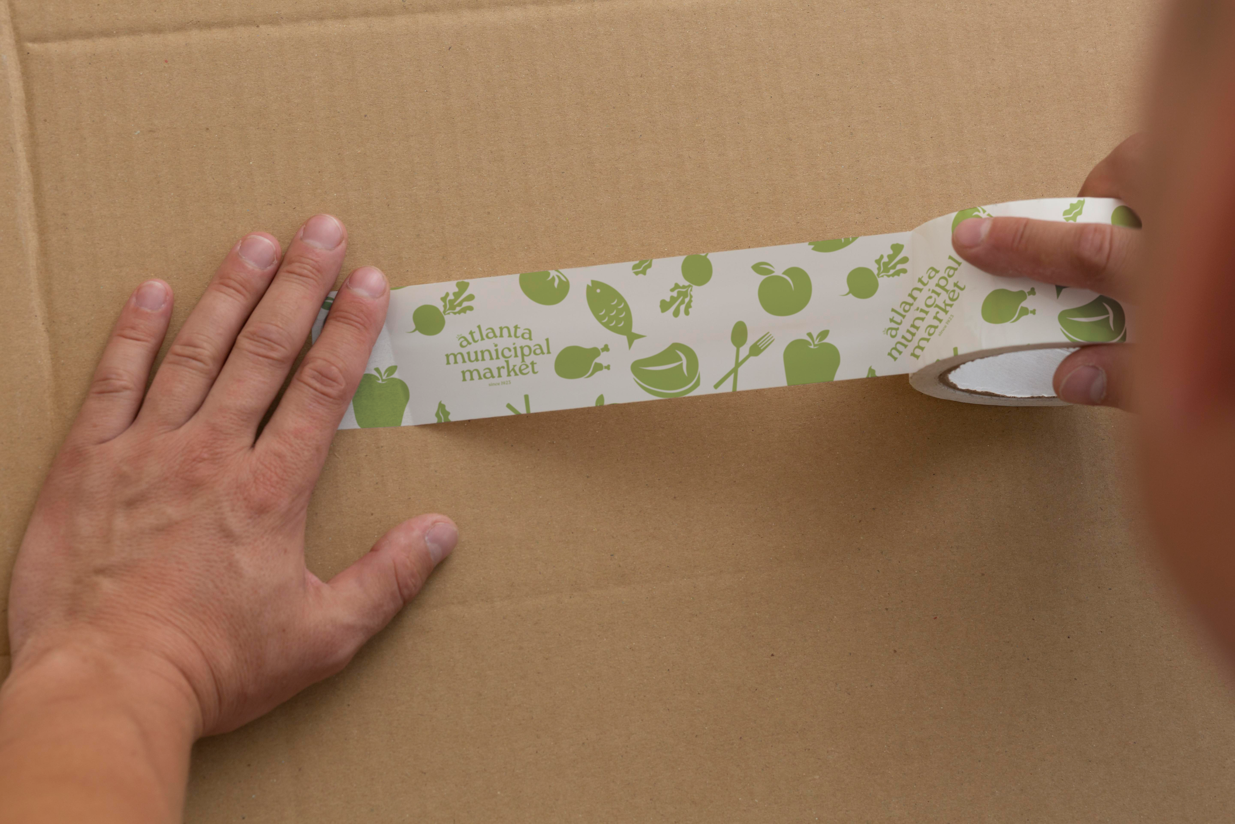 Municipal Market - Packing Tape with Hand.png