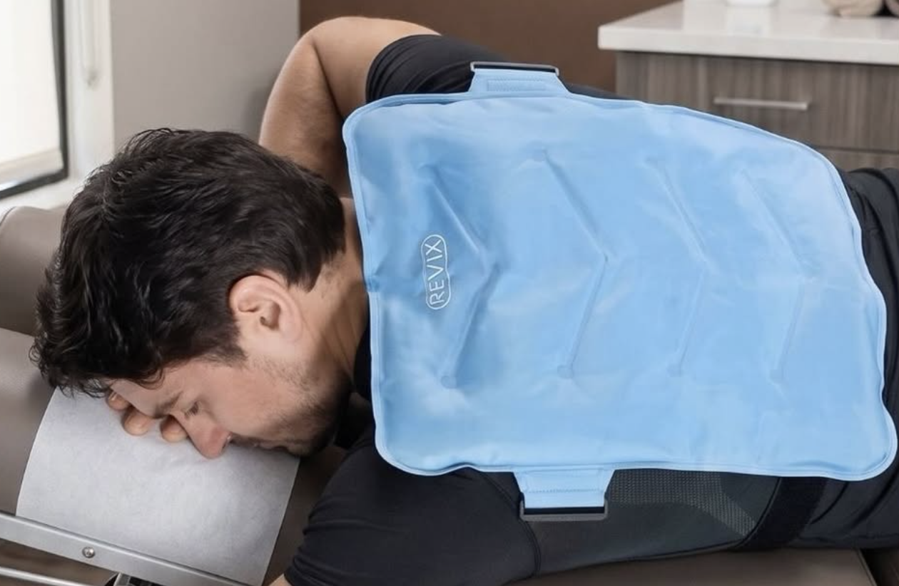 Man with cold pack on his back for cryotherapy