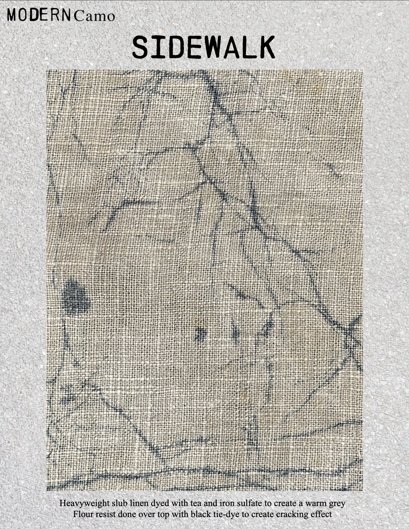A close-up of a textile sample showing a beige linen fabric with a crackled effect, dyed with tea and iron sulfate to create a warm grey color and a black tie-dye pattern.