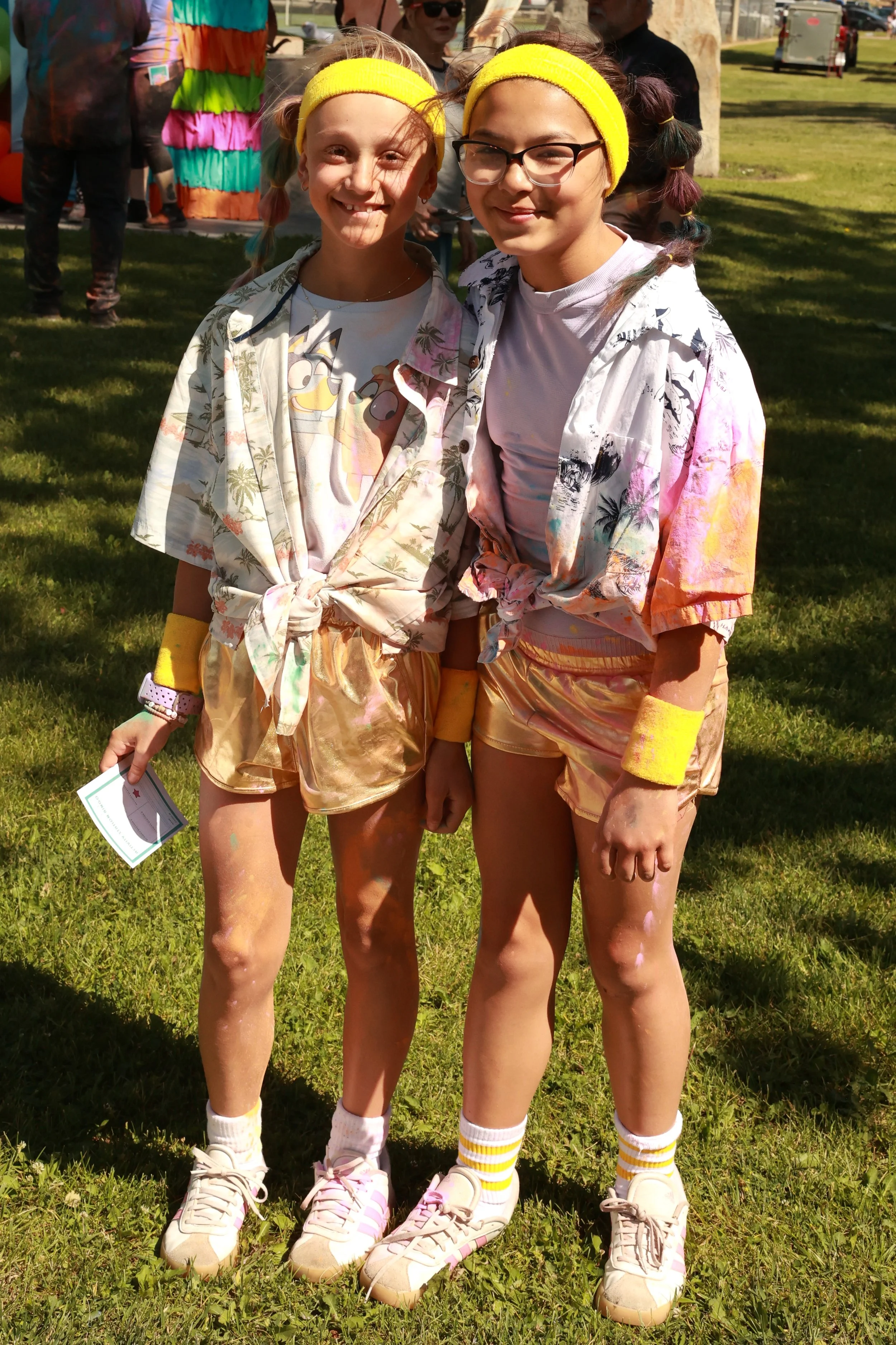 Photo of friends posing for a photo at OBHC's 2026 Color Walk.