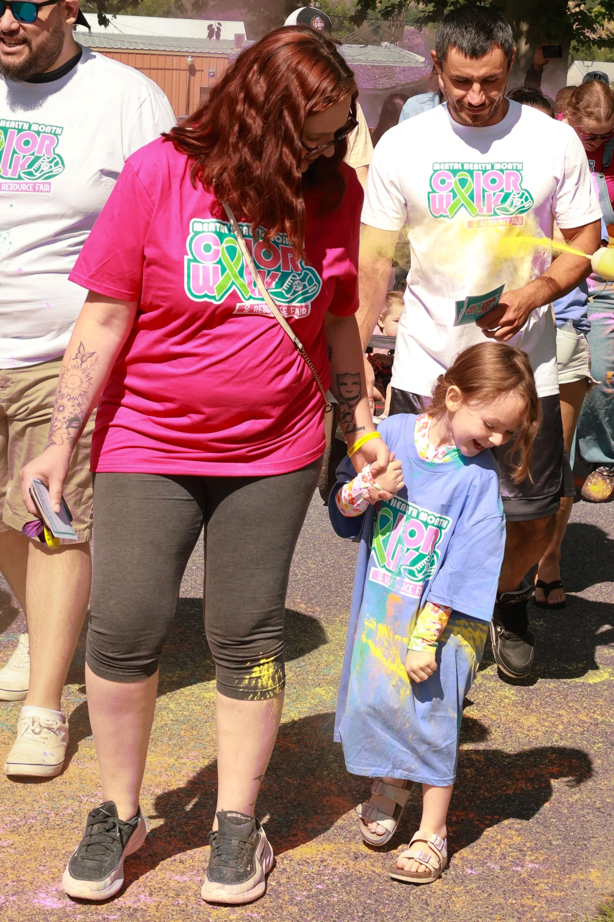 Photo of a family walkign at OBHC's 2026 Color Walk.
