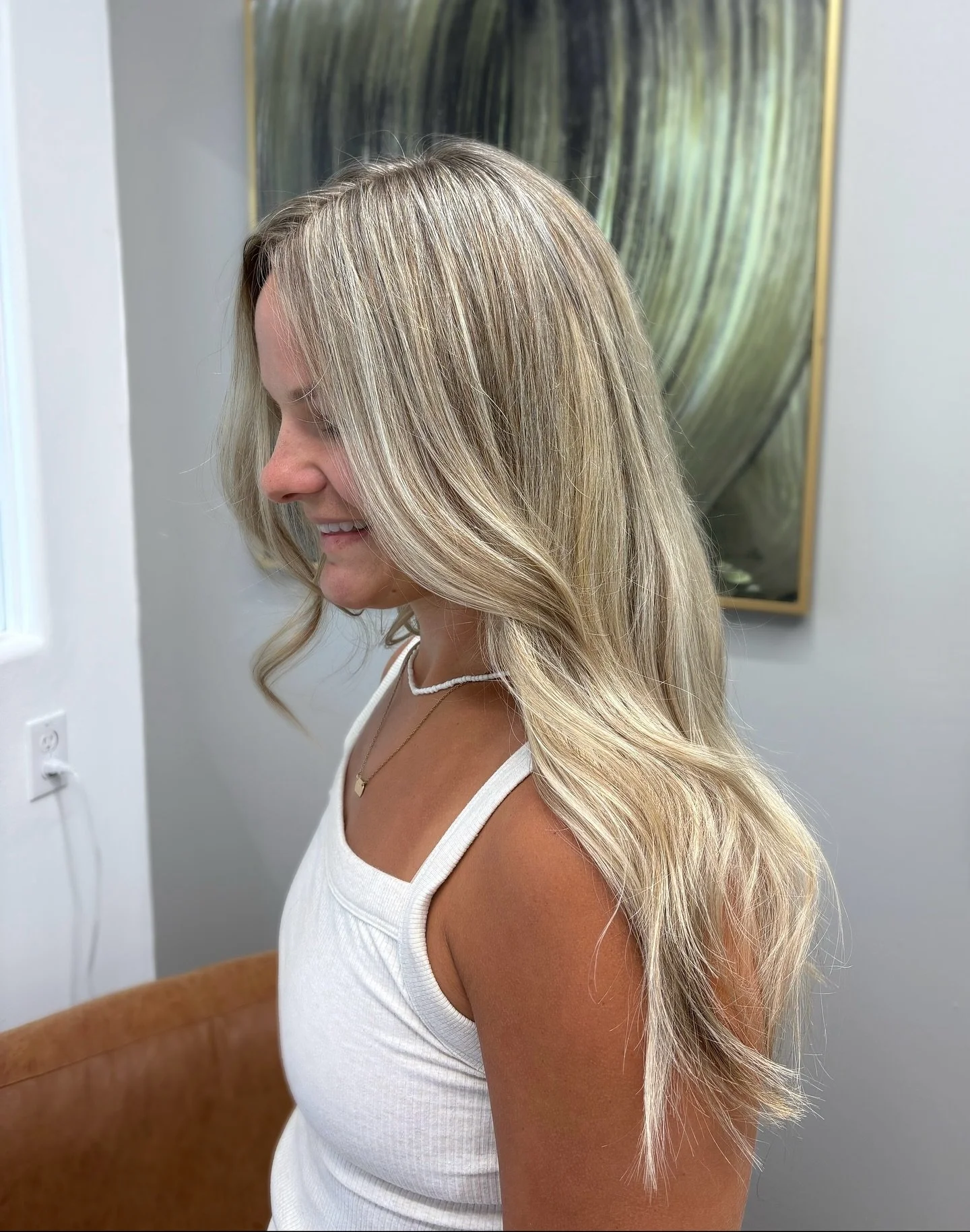 Fall is just around the corner, but she's still bringing the heat with her summer tan and beautiful blonde highlights!