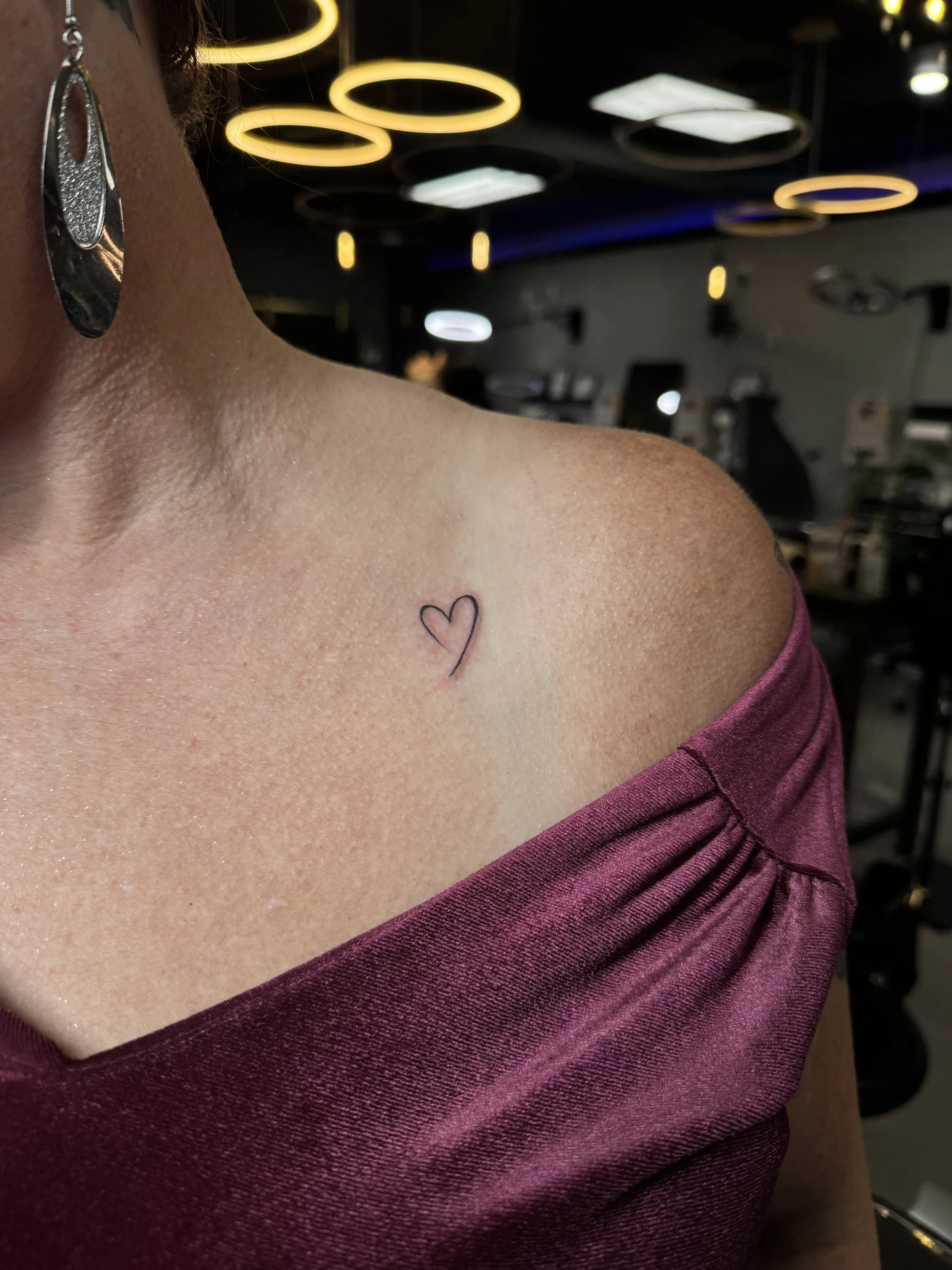 tiny-fine-line-heart-collarbone-tattoo-inkmobster-jenssen-rodas-south-florida.jpg.jpeg