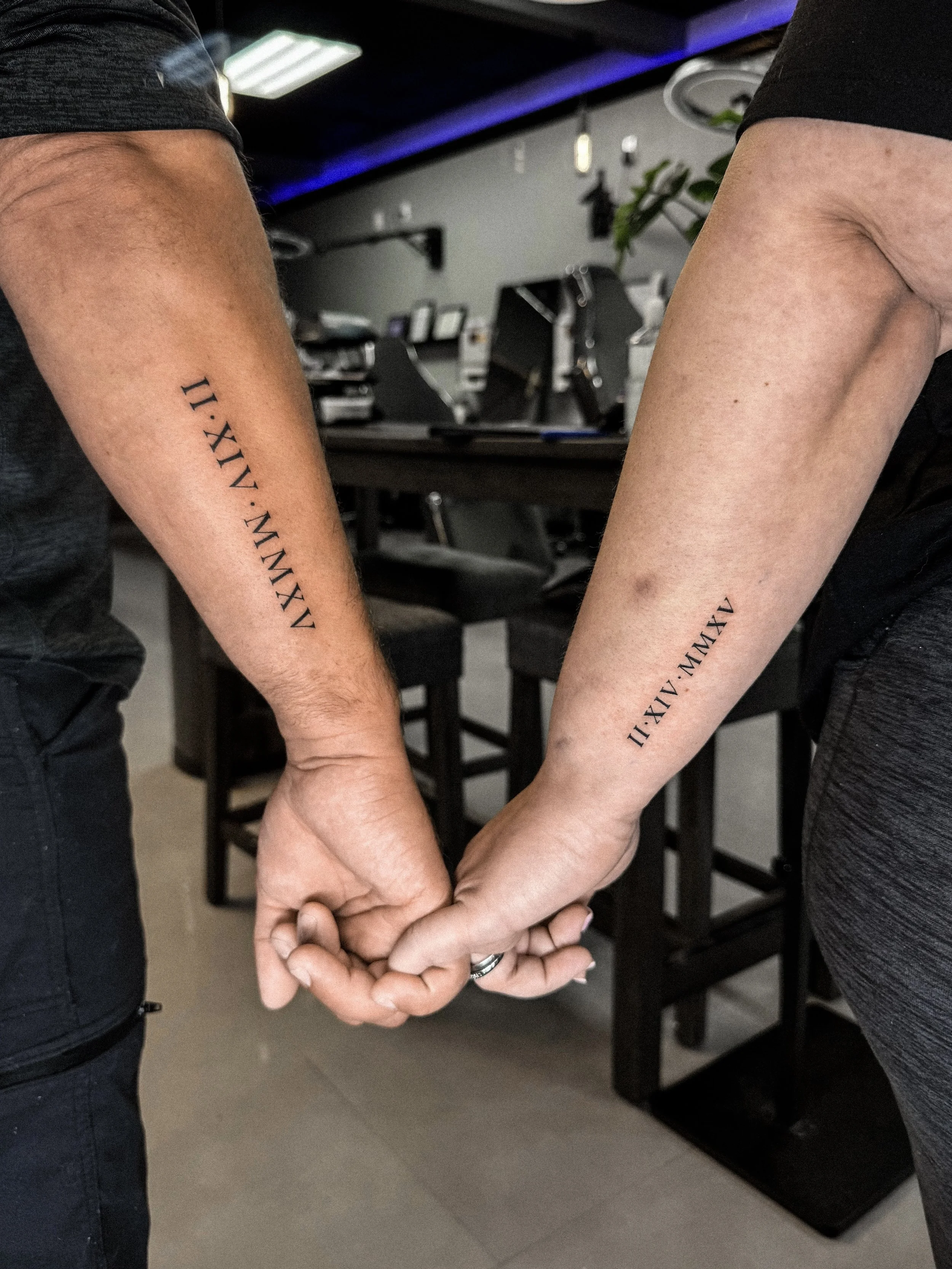 matching-roman-numeral-date-forearm-tattoos-couple-inkmobster-jenssen-rodas.jpg.jpg