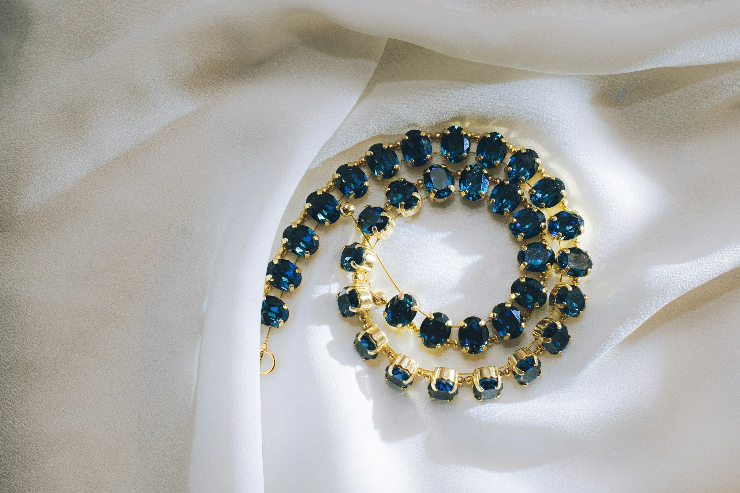 blue stone and gold necklace