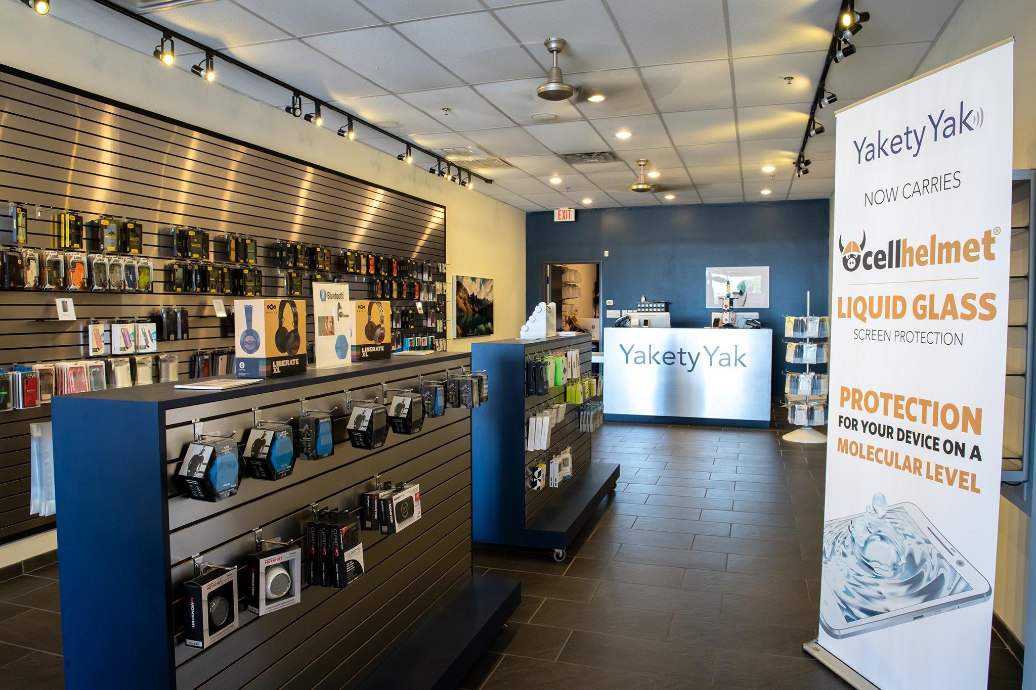 YaketyYak's current interior design with dark tile floors and silver and blue accents