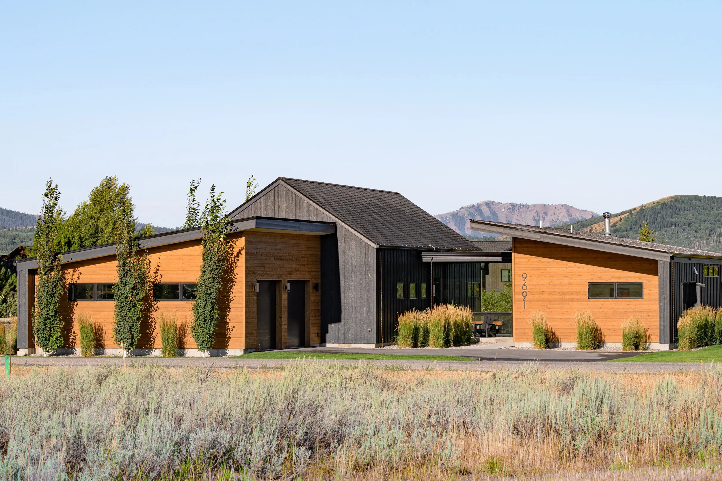 Scandinavian modern residence integrated into mountain landscape in Victor, Idaho designed by Trimbach Builders & Design Studio