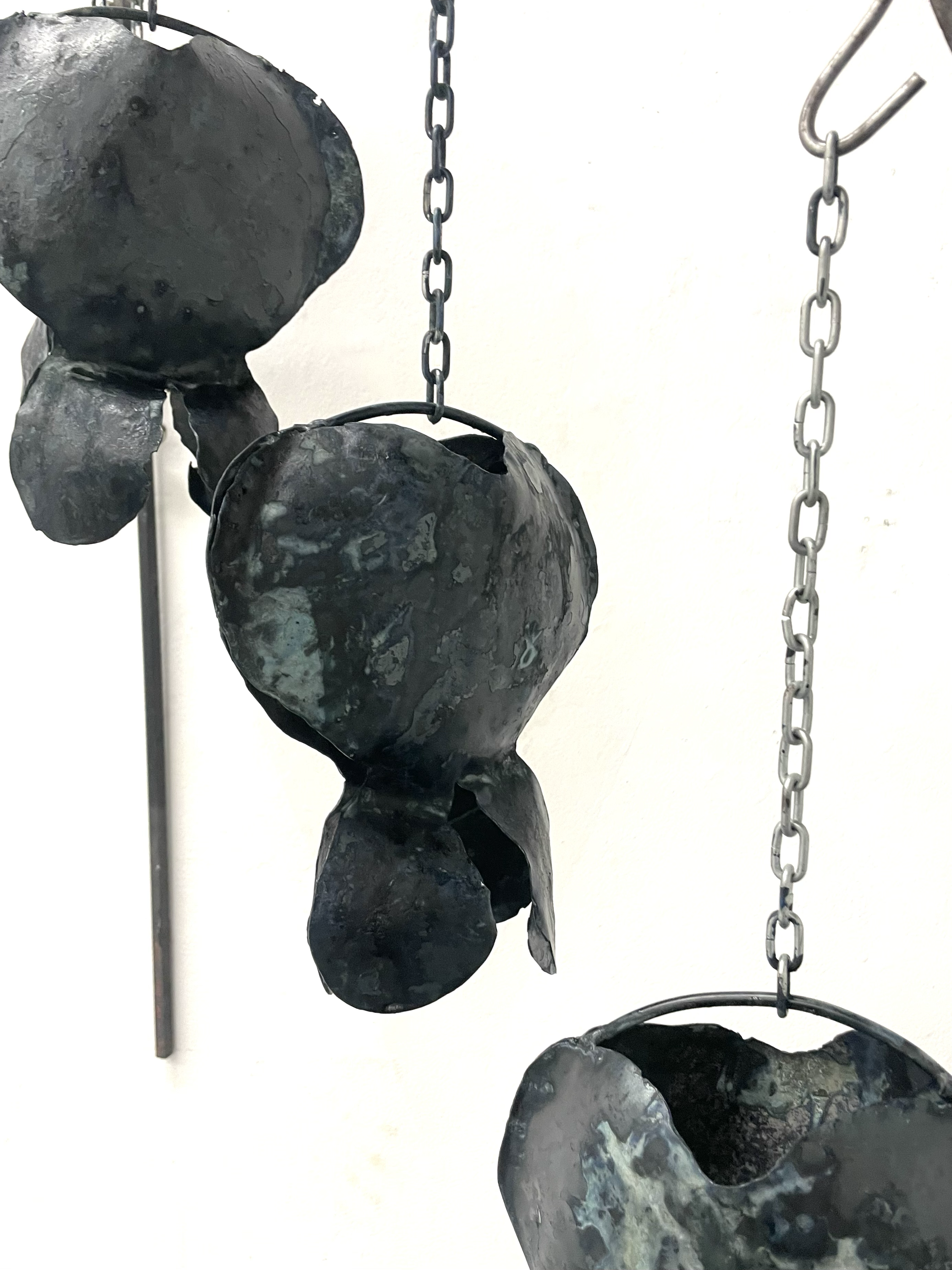 "Ode to my Bleeding Hearts" 2025, Sheet Metal, Iron Rod, Steel Chain.