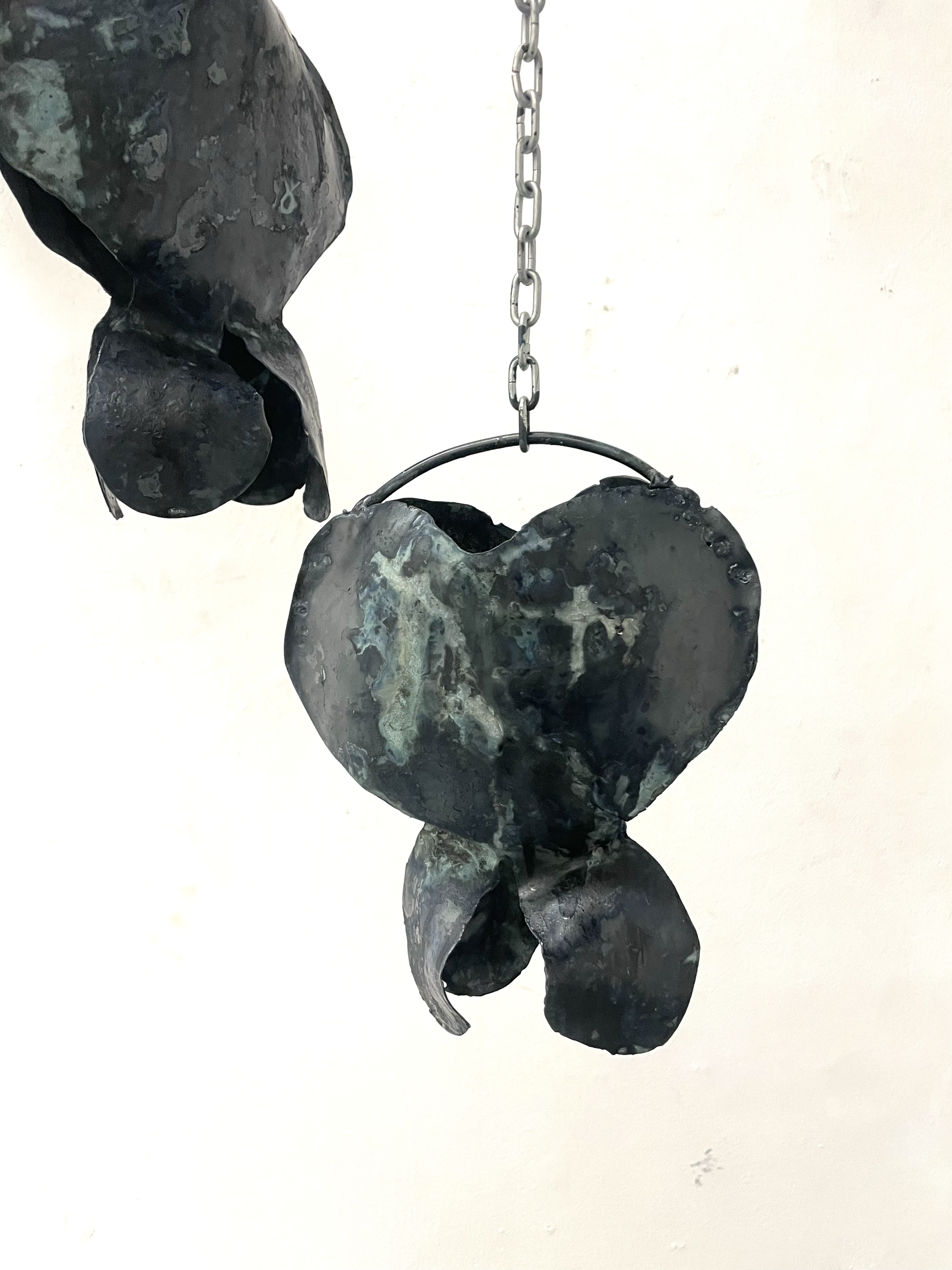 "Ode to my Bleeding Hearts" 2025, Sheet Metal, Iron Rod, Steel Chain.