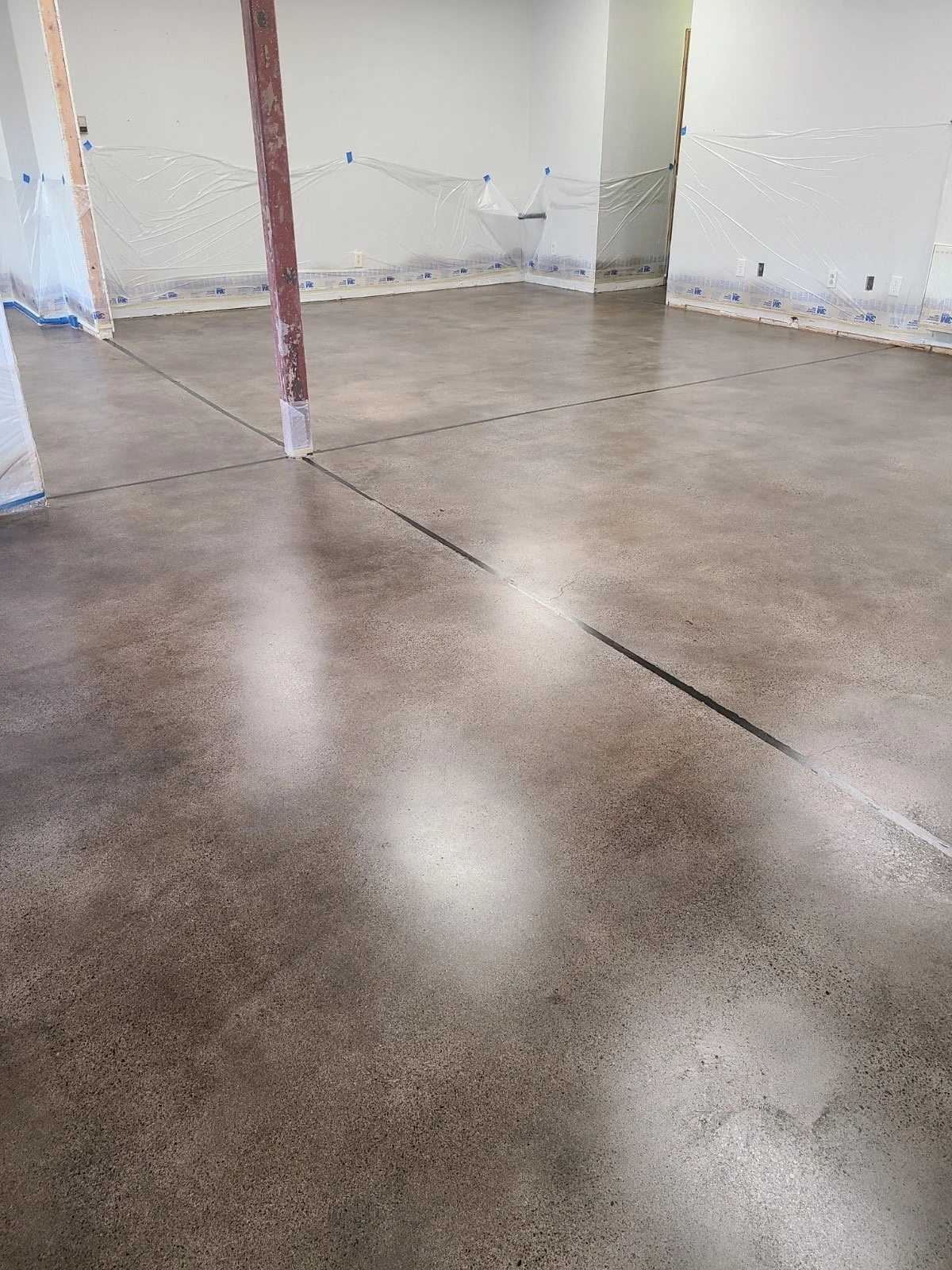 Breckenridge Architect Office Grind Stain Satin Sealed Concrete.jpg