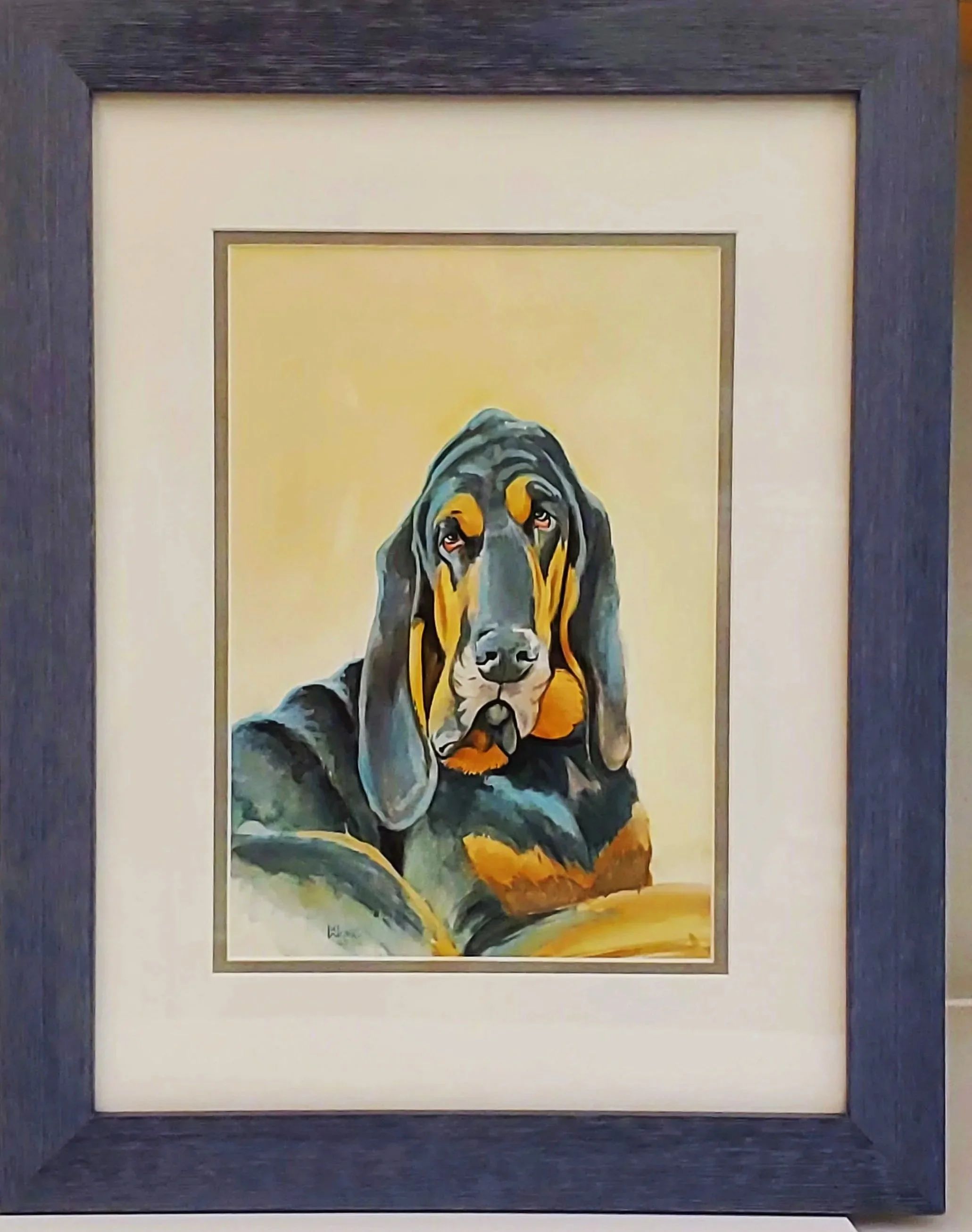 Framed watercolor painting of a basset Hound dog with a yellow background.