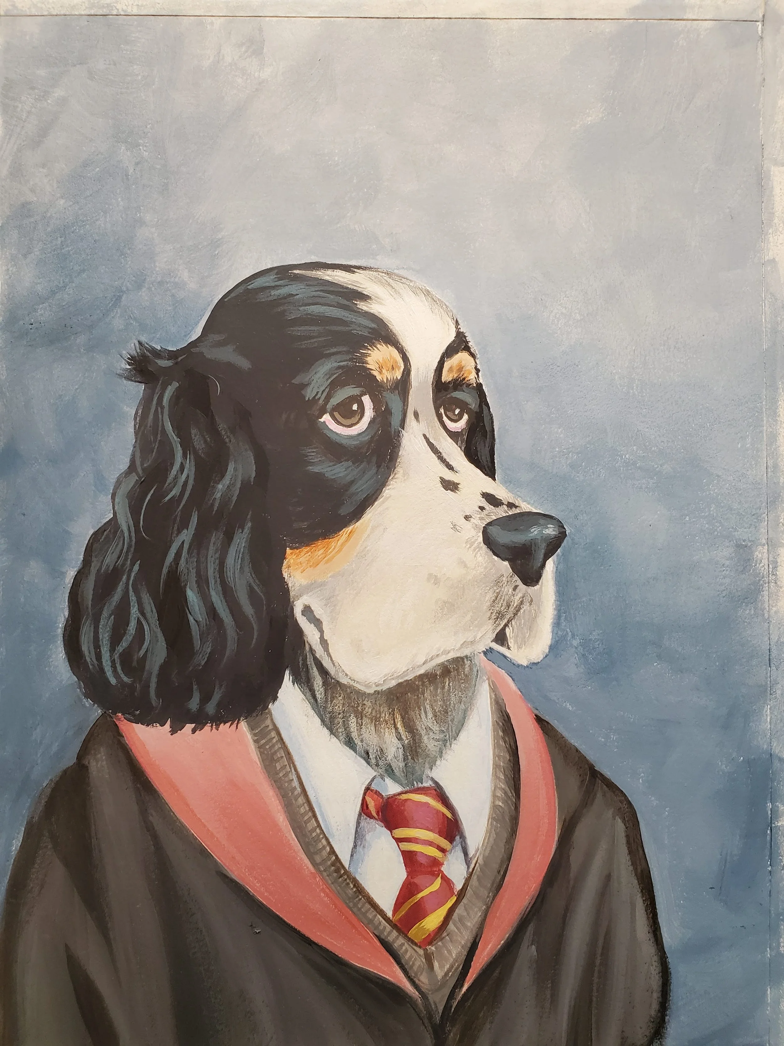 Painting of a dog with long black ears and a white face dressed as Harry Potter, wearing a Gryffindor scarf, shirt, tie, and robe.