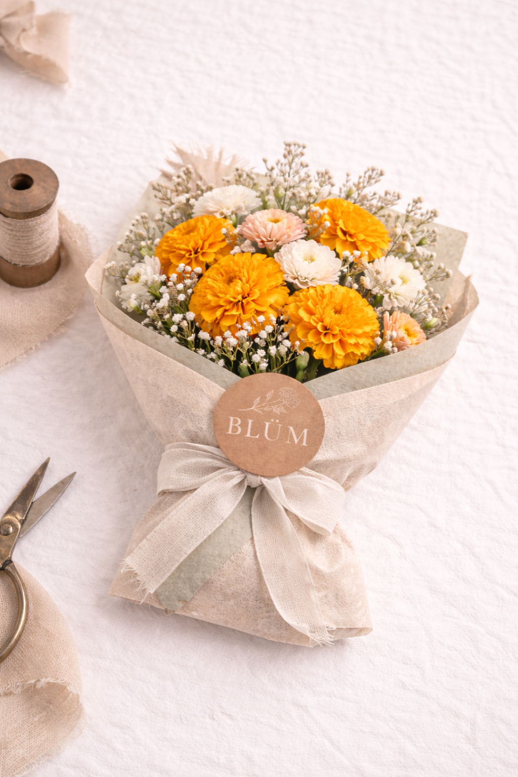 Delicate bouquet with marigolds and chrysanthemums.png