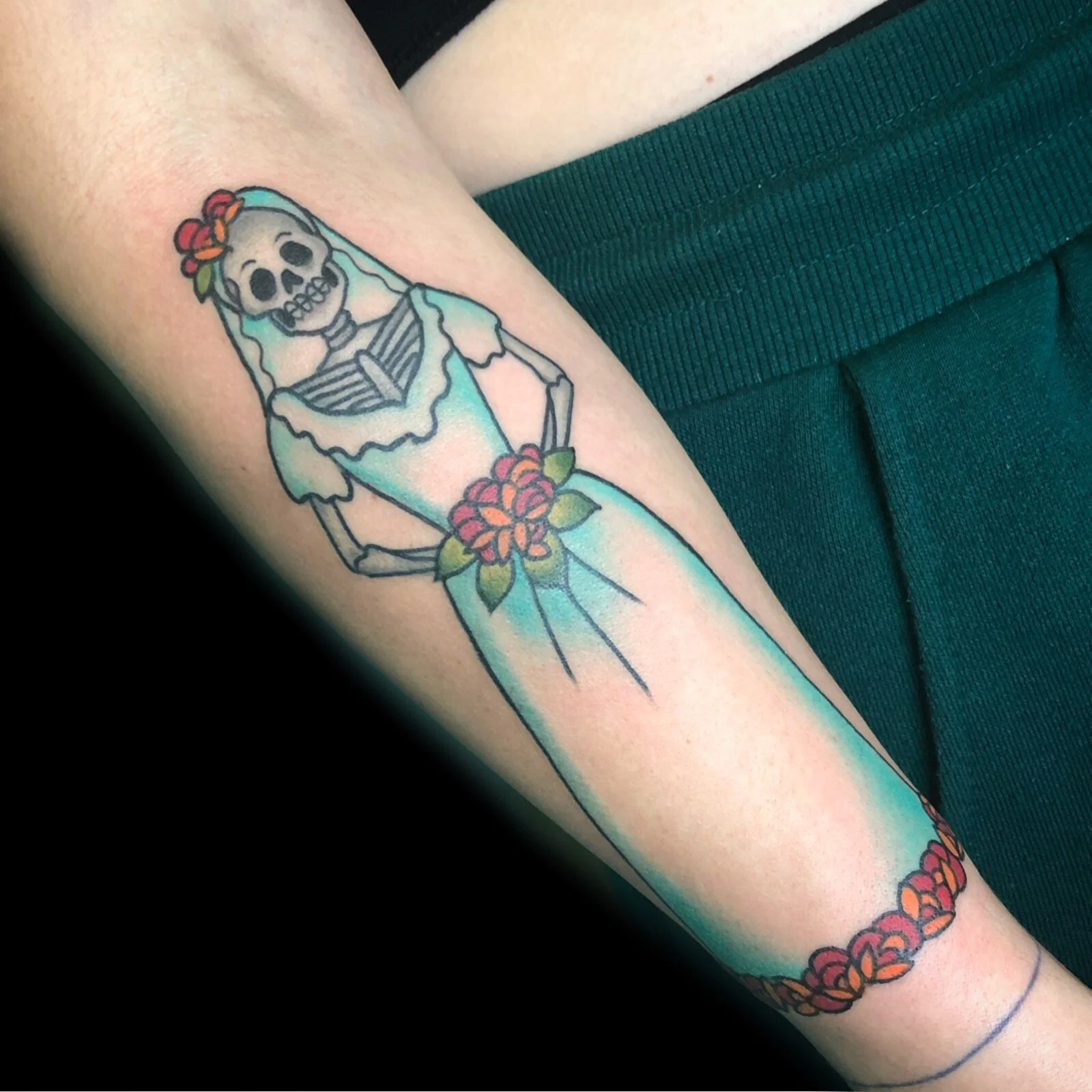 Traditional skull tattoo by Jennifer Lynn at Crown Jewel Tattoo in Tampa Florida 