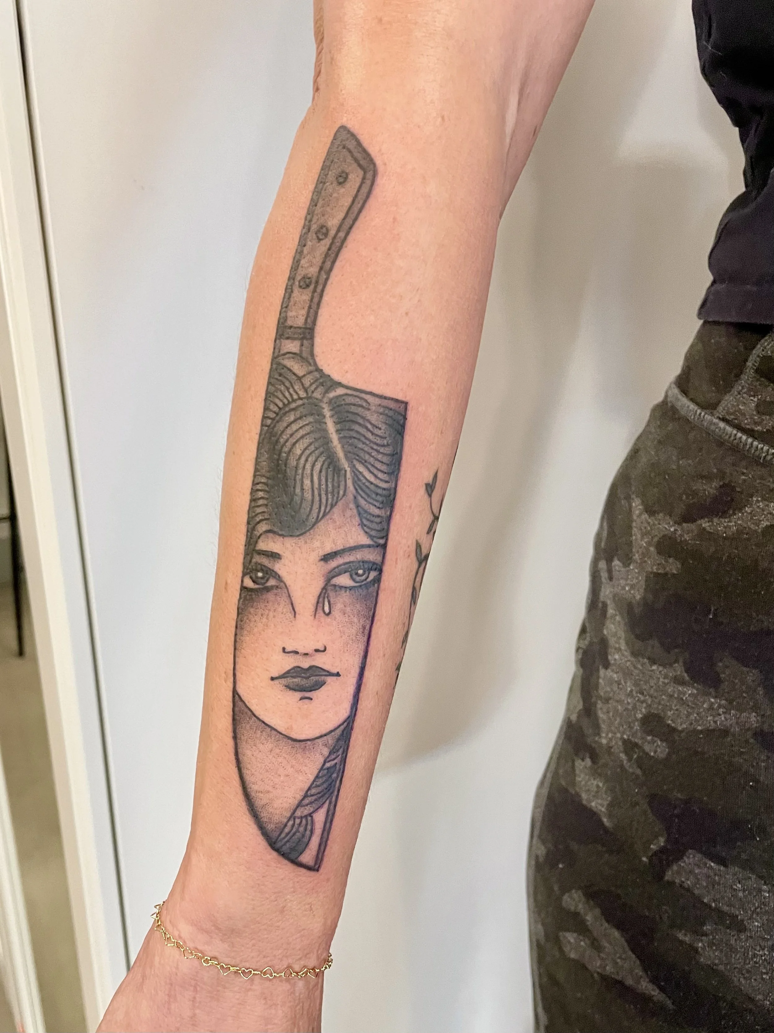 black and grey dagger lady head tattoo by Jennifer Lynn at Crown Jewel Tattoo in Tampa Florida 