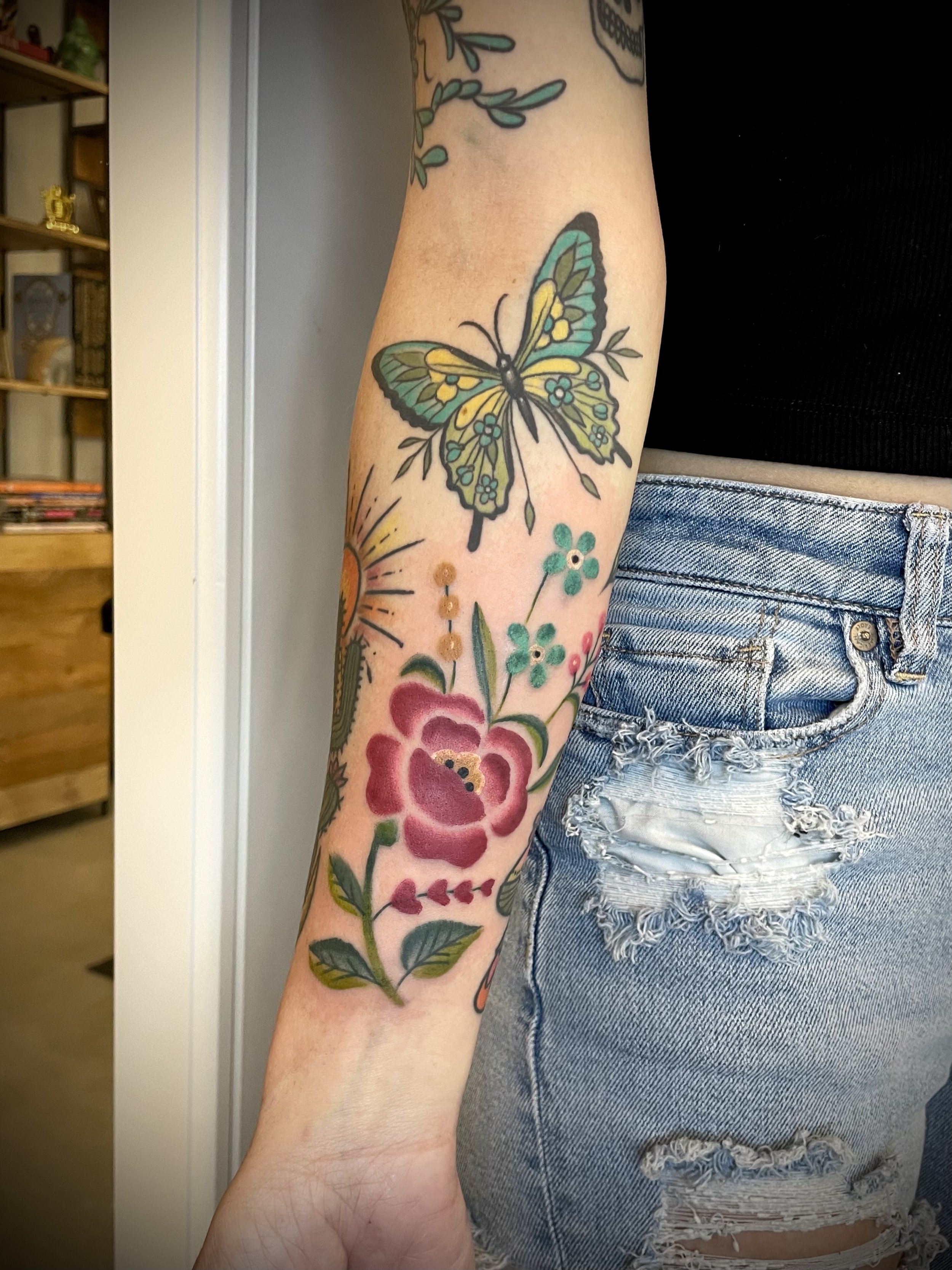 Watercolor rose tattoo by Jennifer Lynn at Crown Jewel Tattoo in Tampa Florida 