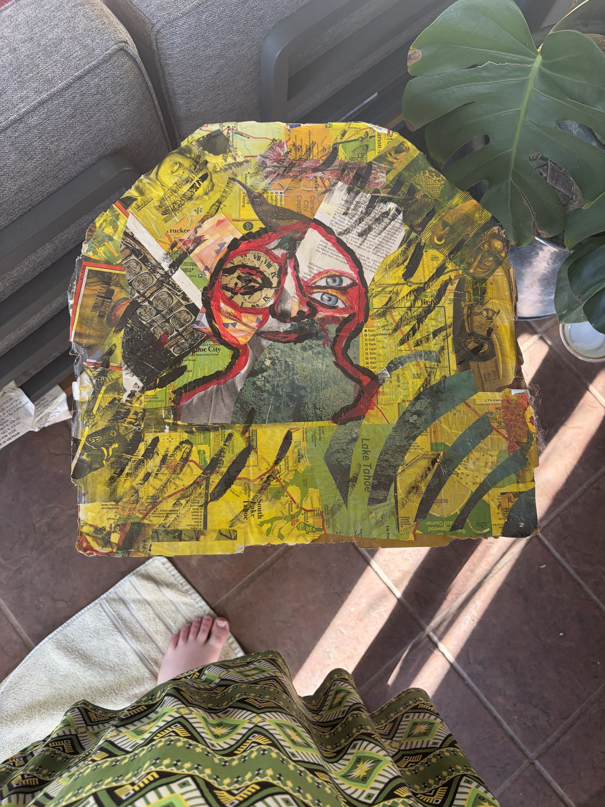 “Looking through time” A mixed media piece done on an old pizza box in acrylic with the background done in a collage style. (NOT FOR SALE) 