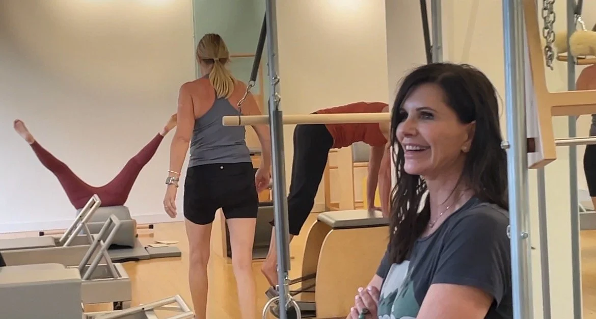 Clients training in small-group classical Pilates classes at Lift Pilates in Davis.