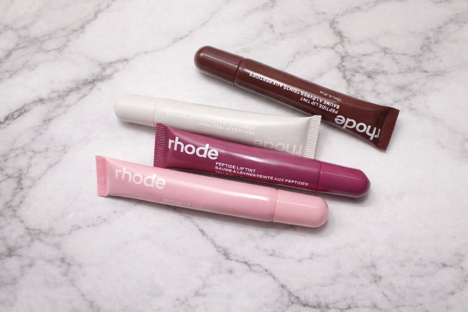 I actually like Rhode Lip Balms…