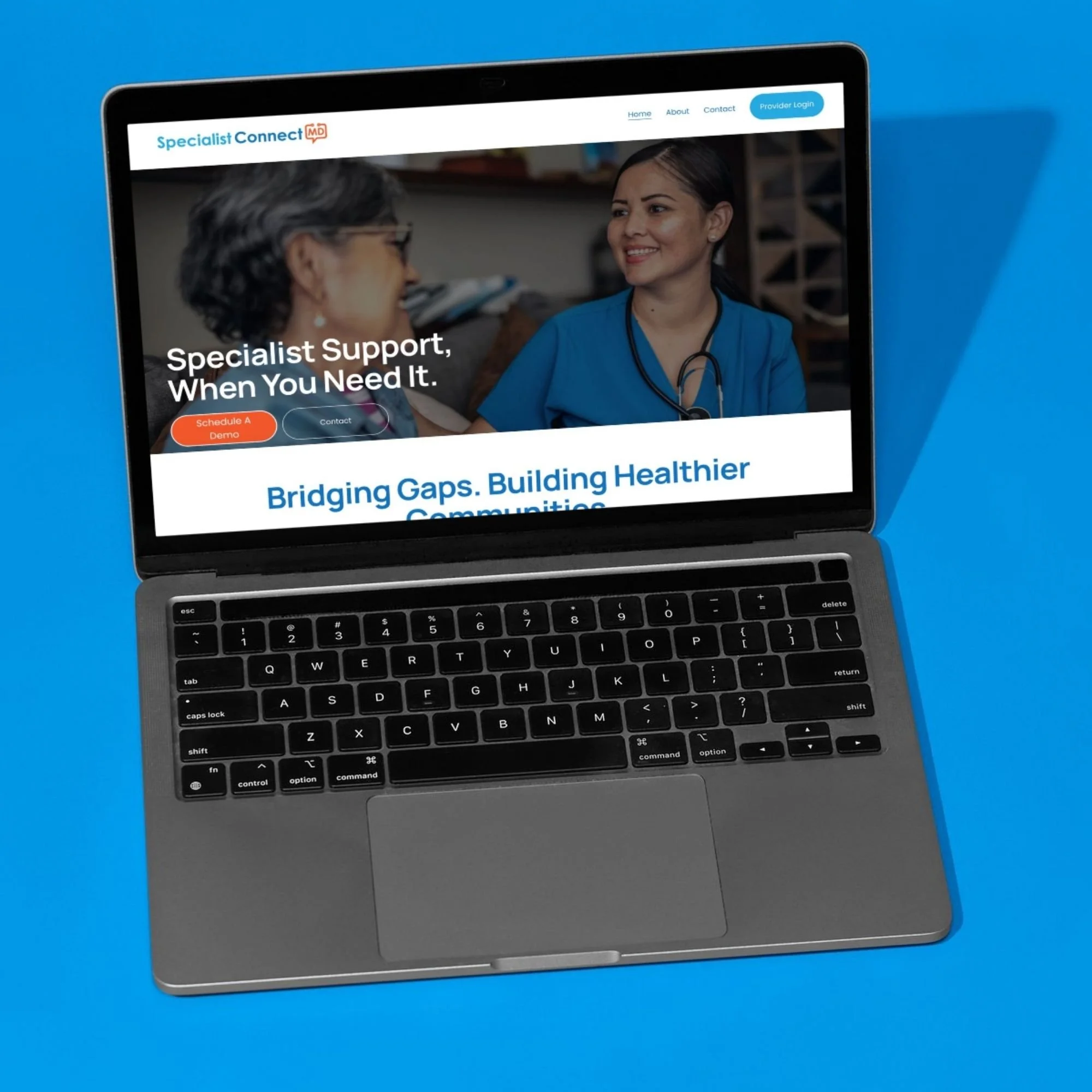A laptop displaying a healthcare website called 'Specialist Connect' on a blue background.