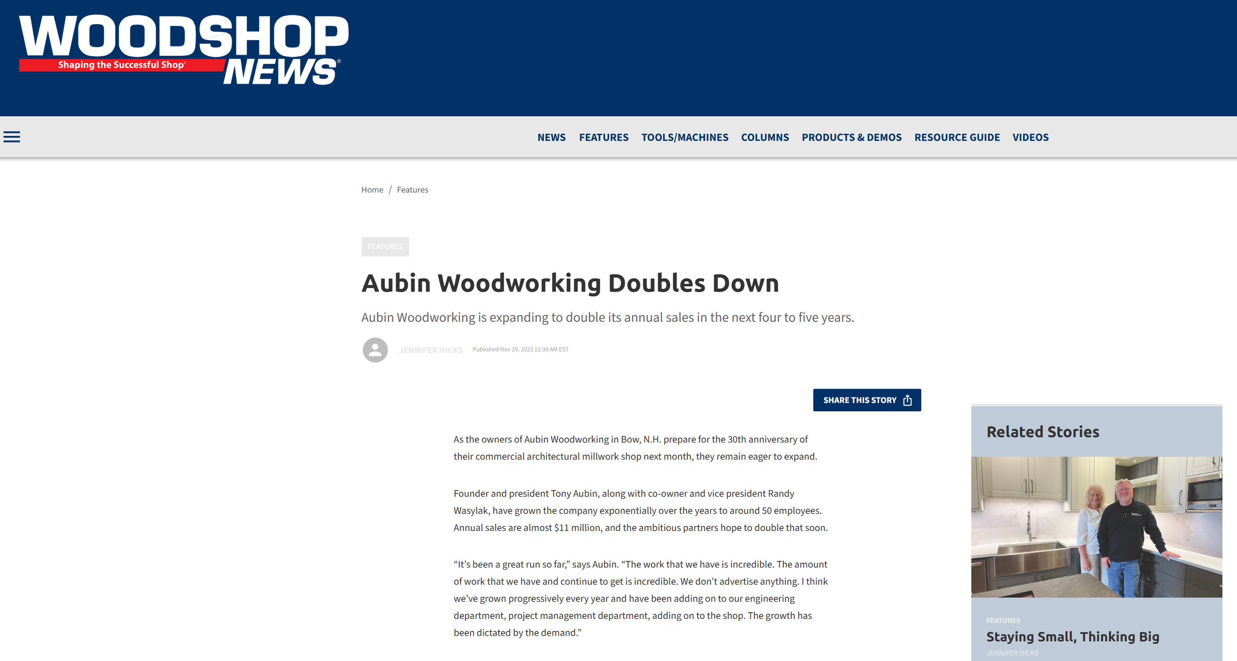 Screenshot of a webpage from Woodshop News featuring an article titled 'Aubin Woodworking Doubles Down'. The page shows the website header with navigation links and a partial image of two people standing in a kitchen with dark cabinetry and a large sink.