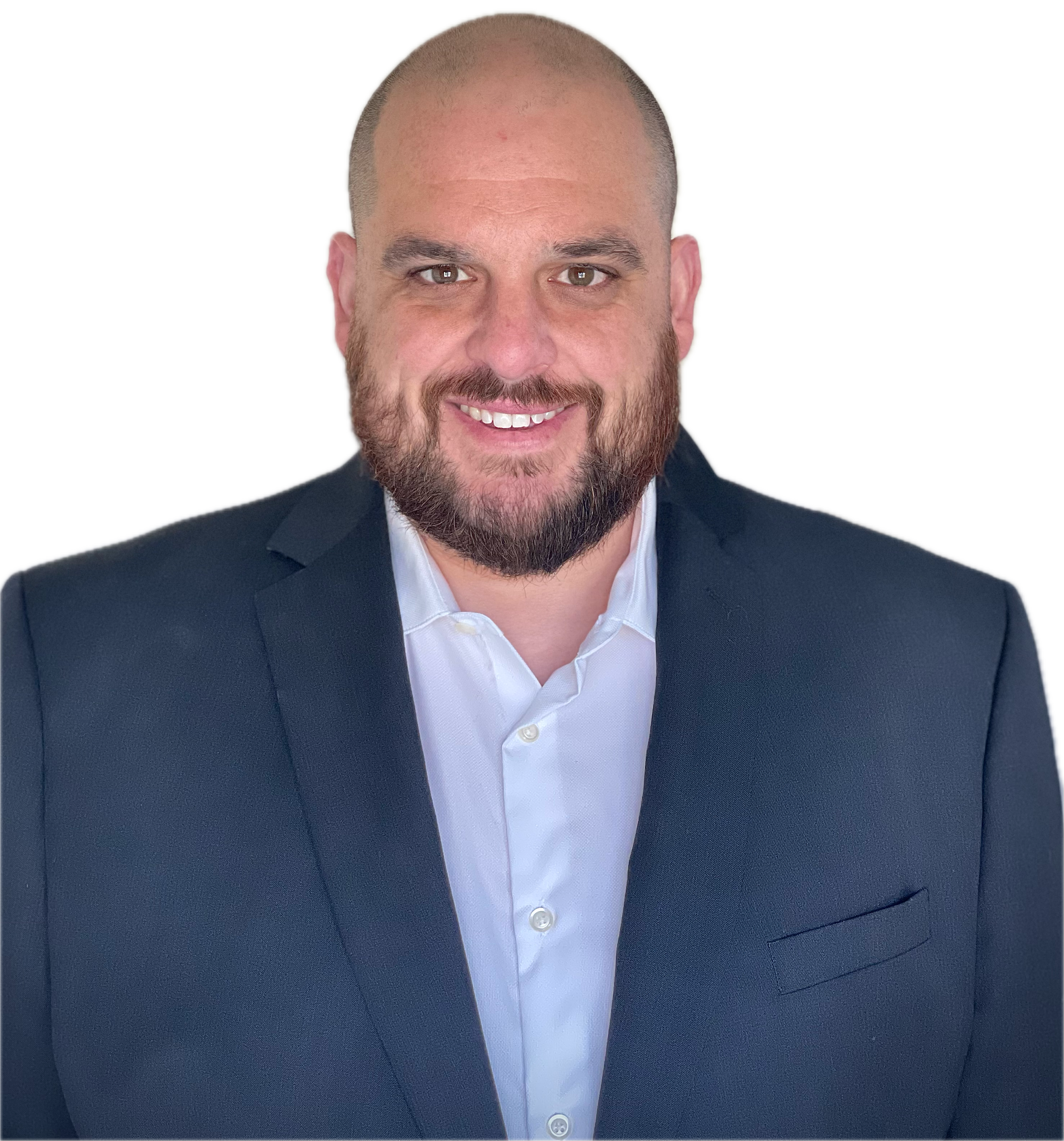 Headshot of a man with a shaved head and beard, wearing a dark suit jacket and white shirt, smiling at the camera.