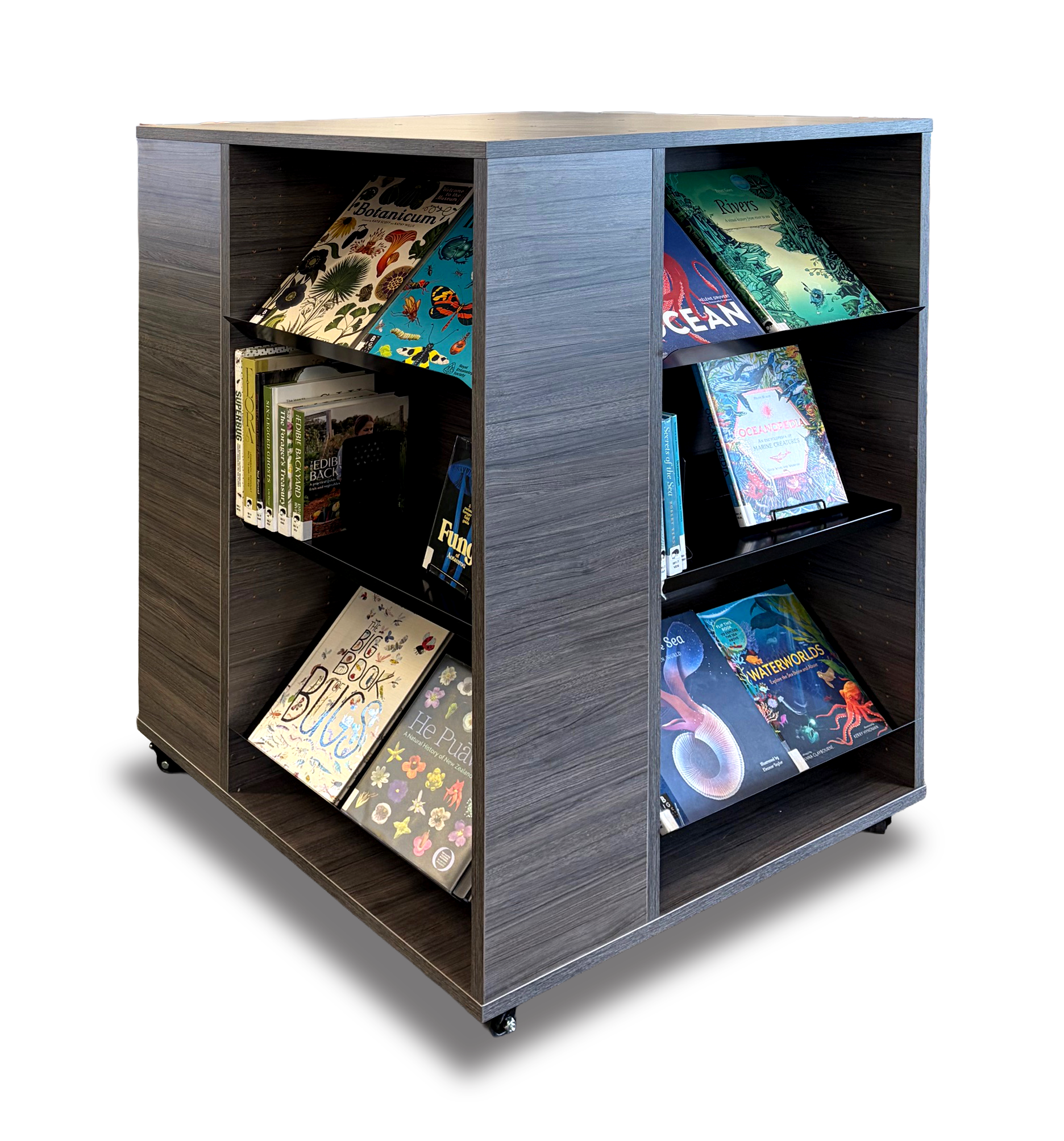 A wooden rolling library cart with two shelves, filled with various books including nature, science, and art topics, on a black screen background.
