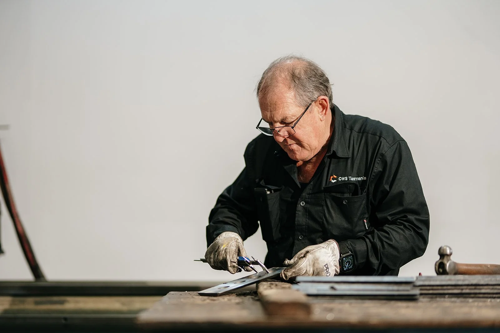 Paul Haas, CWS Tasmania team member, knife sharpening technician.