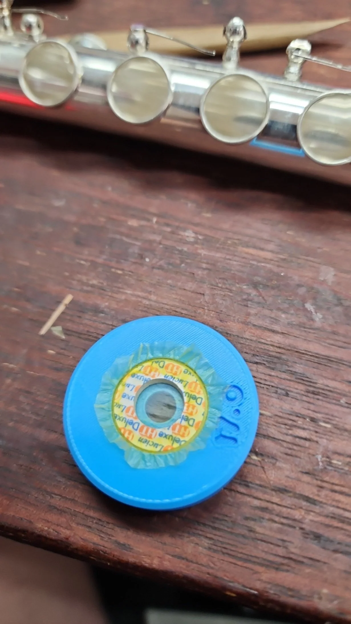 Flute pad reskinning