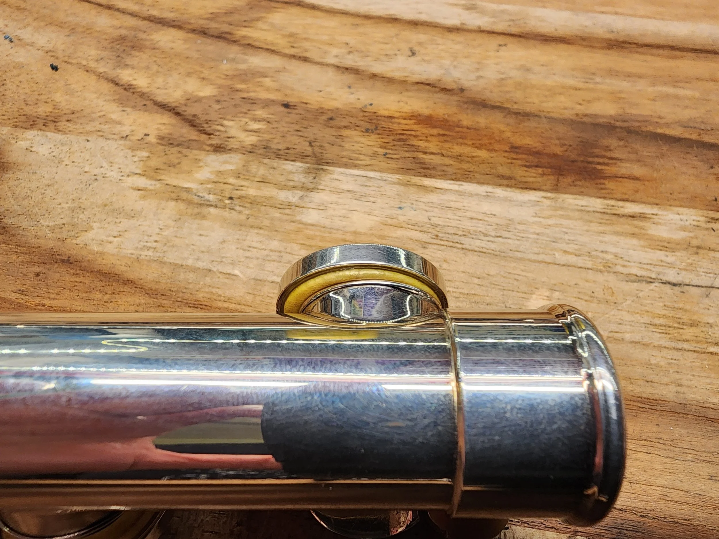 Bent flute key