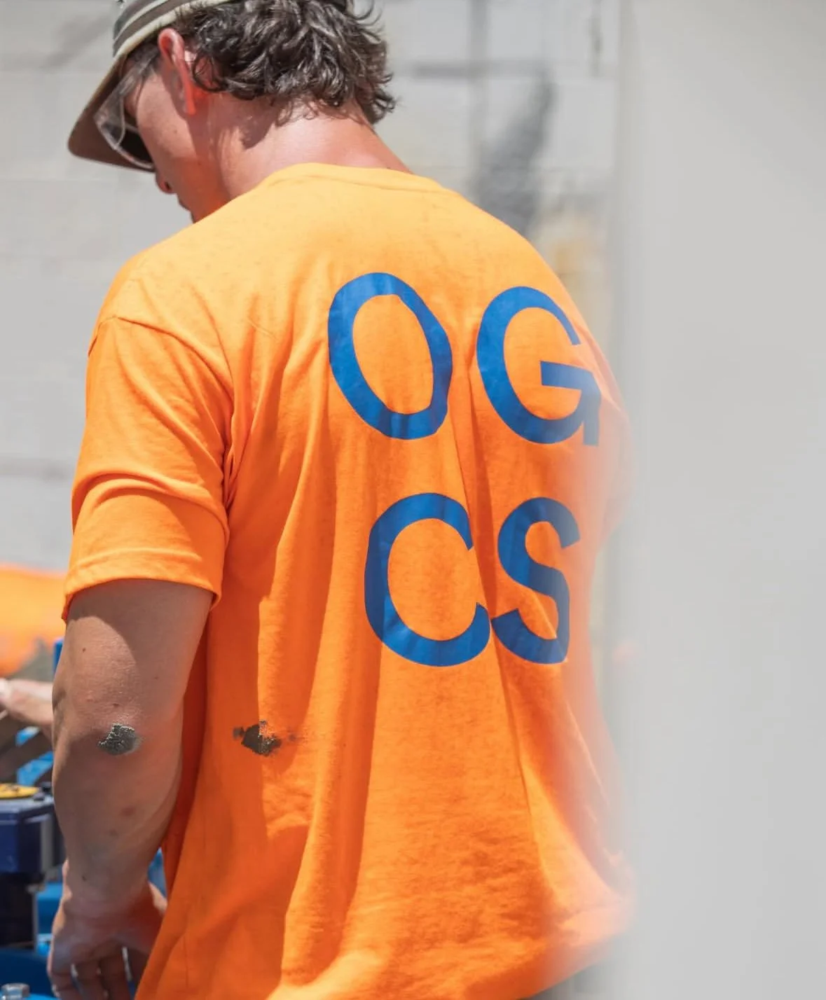 Omni Group Construction services worker on site providing concrete and building services