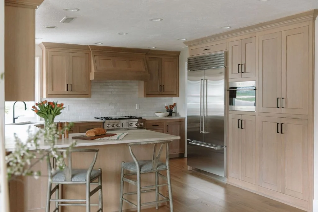 Custom-designed kitchen with quartzite countertops, white oak cabinets, high end appliances in Logan, Utah
