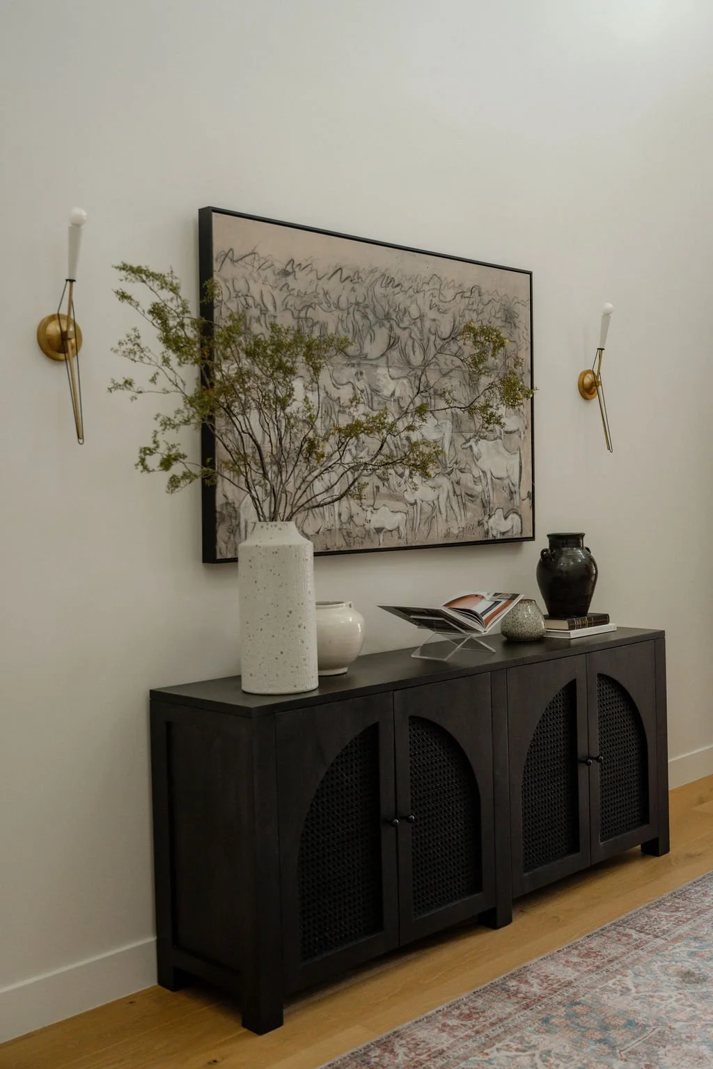 Entry with modern art and organic sconces