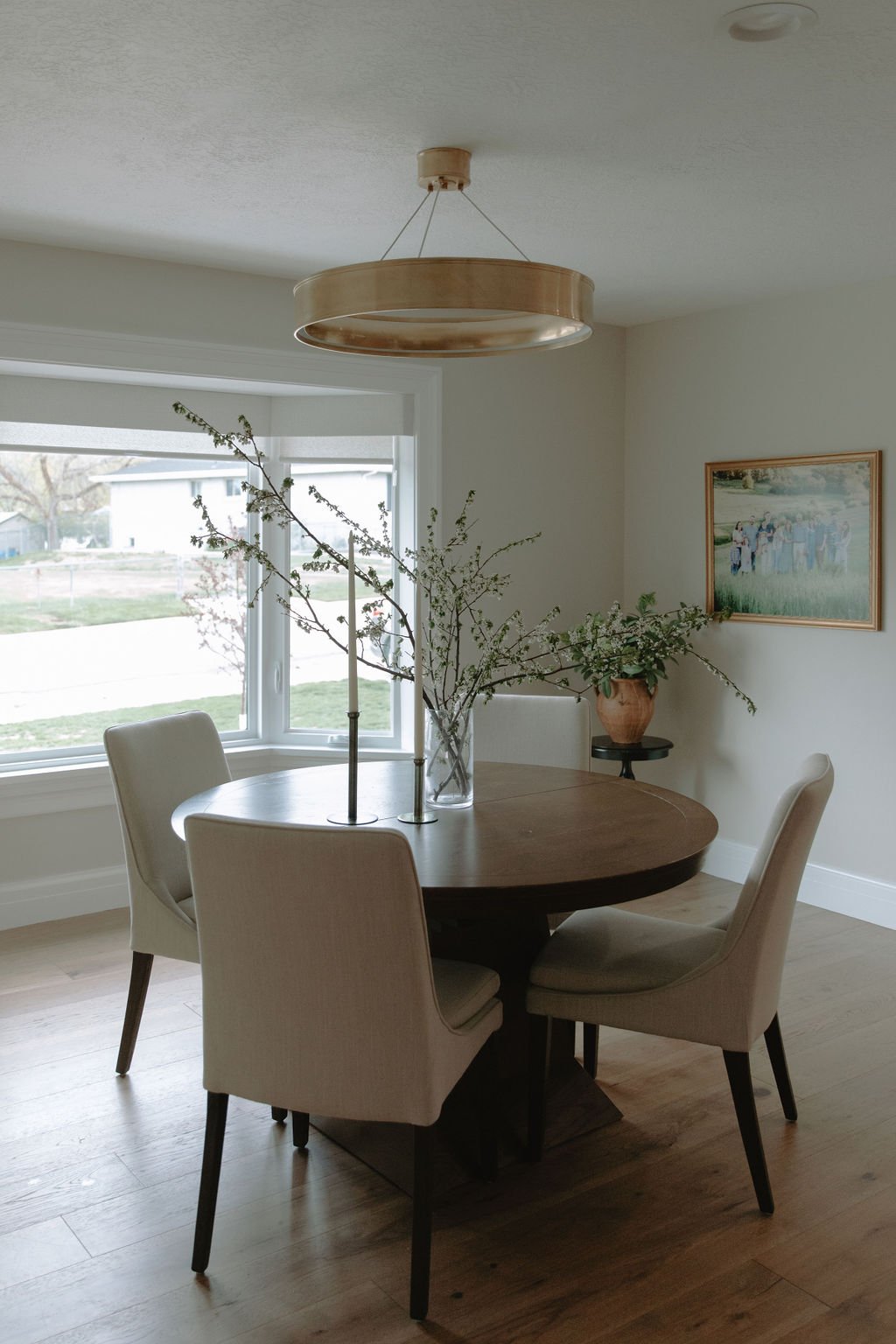 Dining area with a round table, high quality seating and views of neighborhood