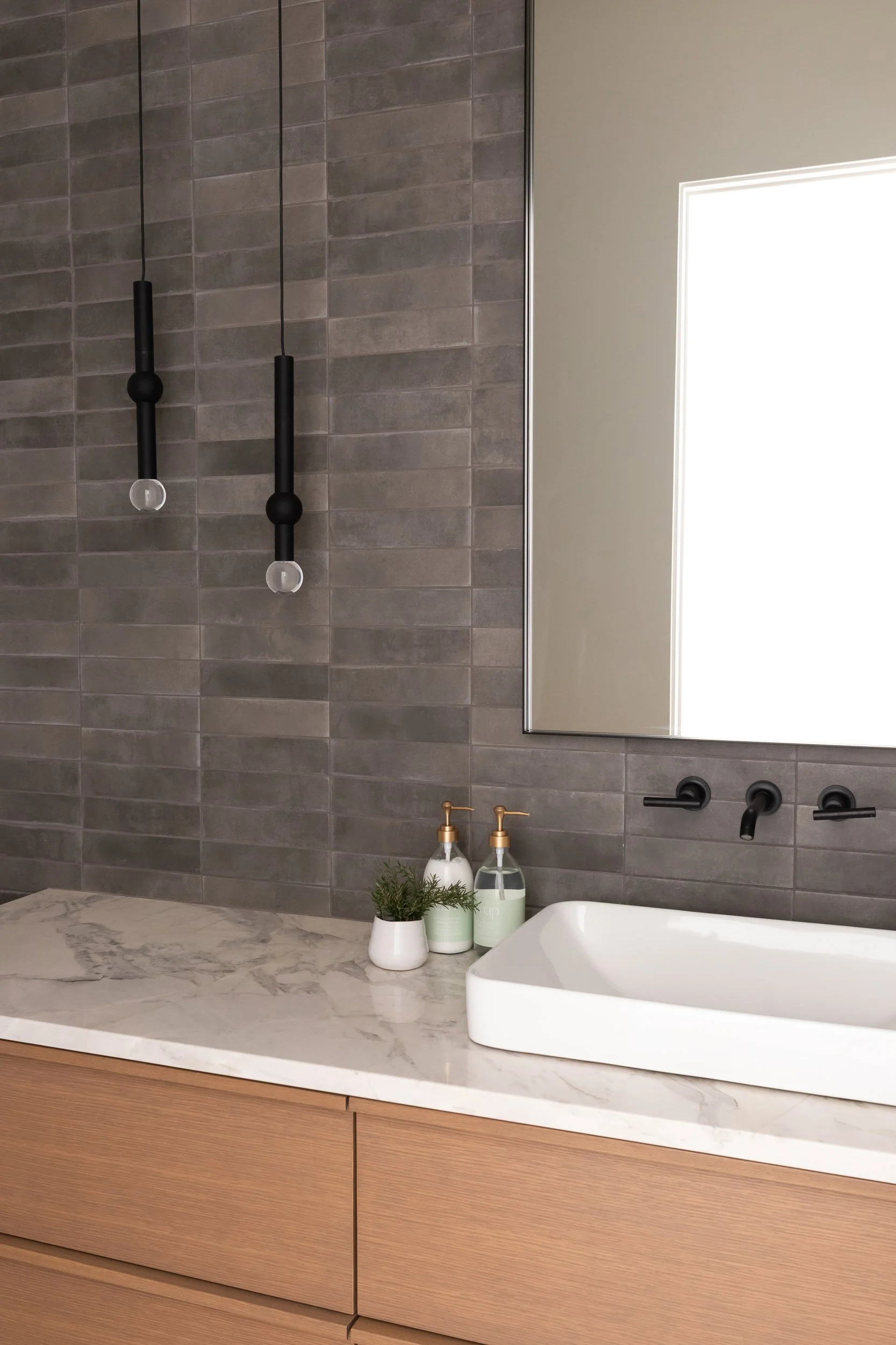 Modern Bathroom with Full Tile Wall.jpg