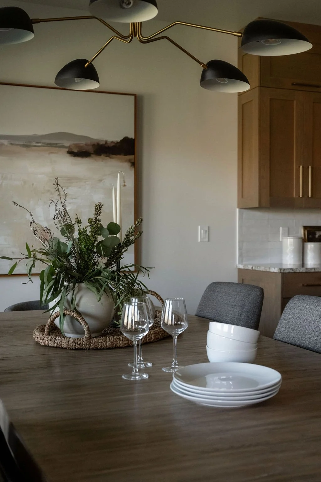 Cozy dining space with an earthy color palette, natural textures, and modern decor elements in a luxury vacation home