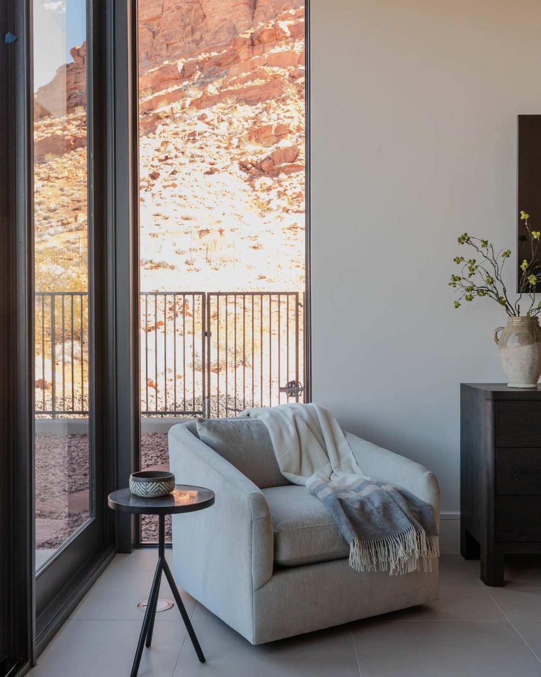 Windows that extend all the way to the floor create a stronger connection to the outdoors and help a space feel more grounded.

It is a subtle detail, but it changes everything.

You feel closer to the landscape, the light comes in differently, and t