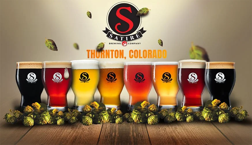 Seven glasses of craft beer in various colors lined up on a wooden surface, surrounded by hop cones, with a logo of Satori Brewing Company and the text 'Thorton, Colorado' above.