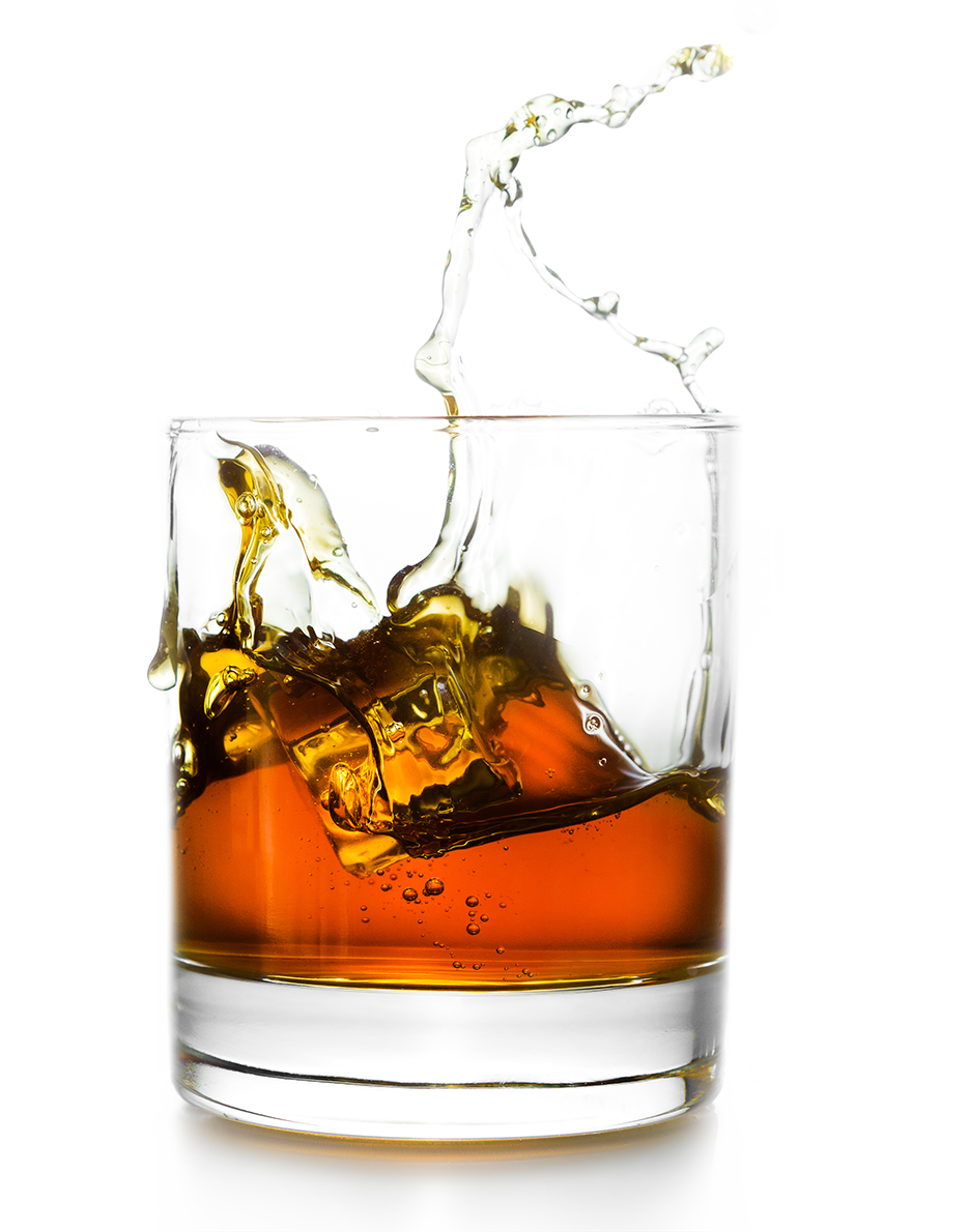 A glass of dark-colored soda with ice cubes, with liquid splash above it.