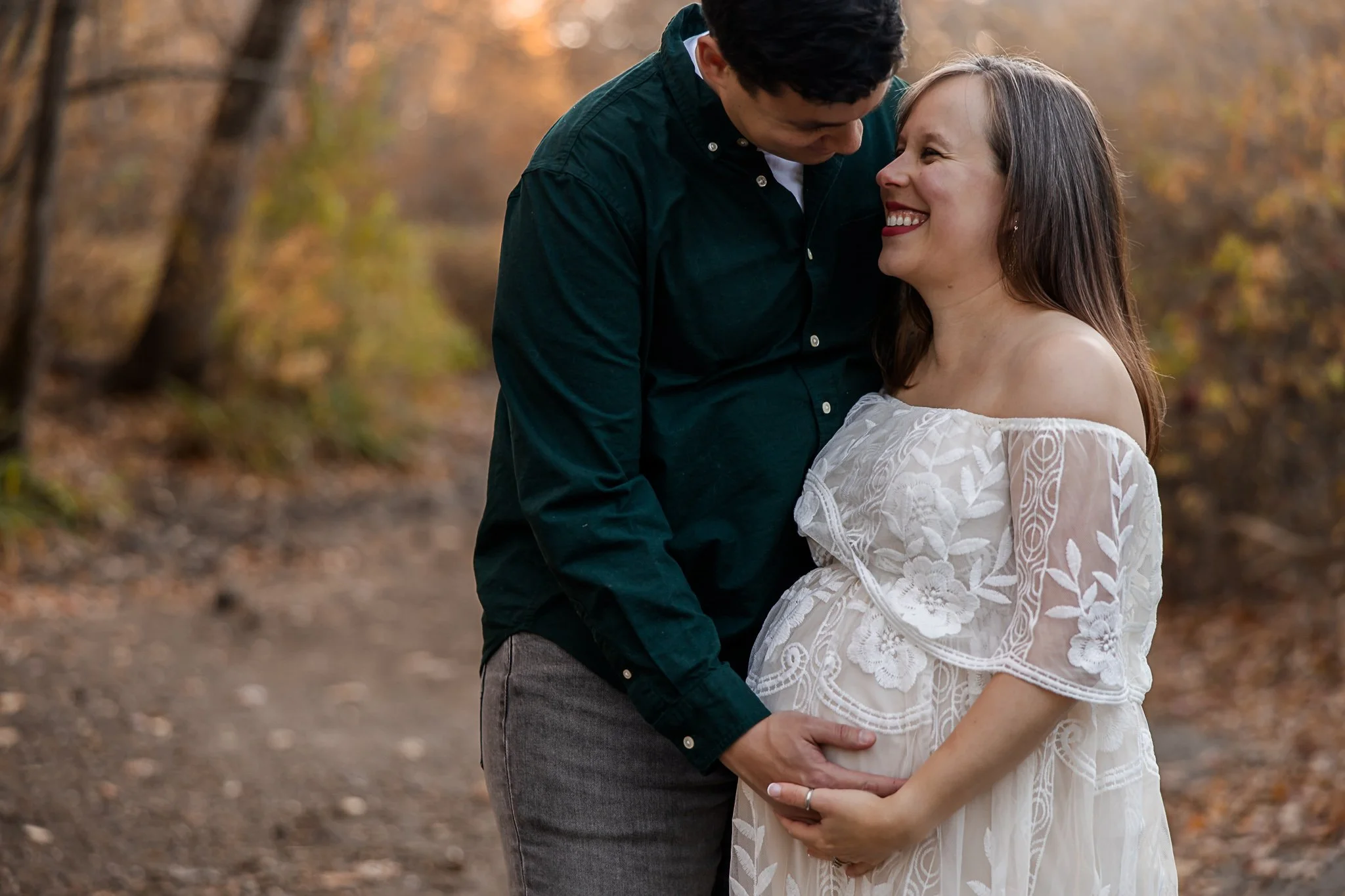 Boston maternity photographer capturing mother glowing in natural light