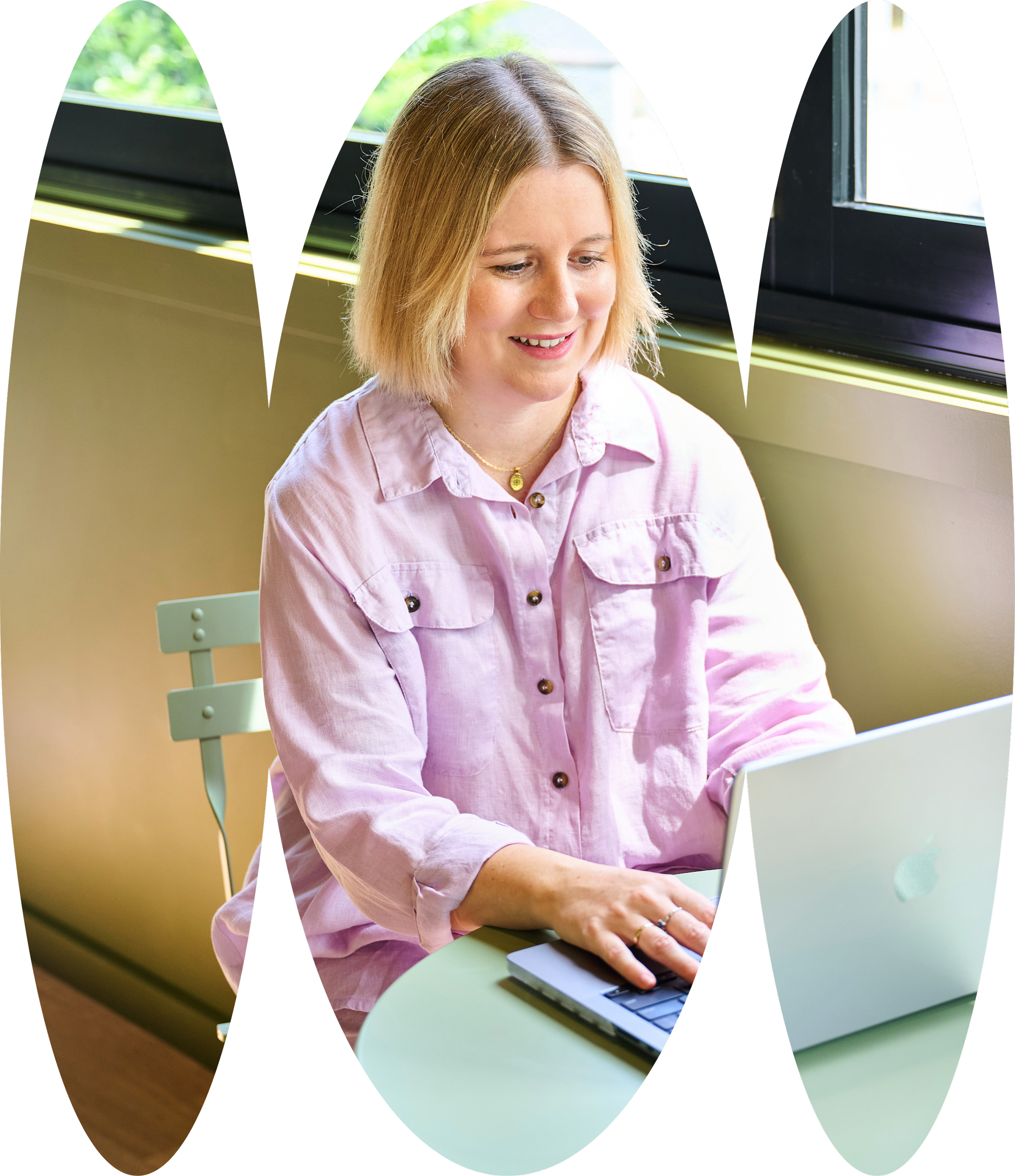 Dietitian Shannon Morley holding a Telehealth consult on a laptop.