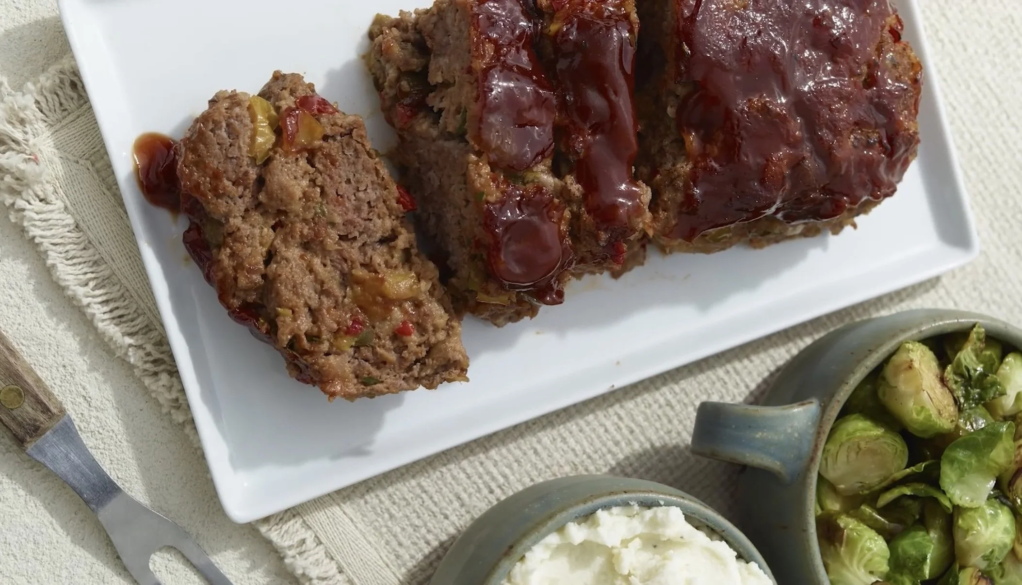 Signature Royal Blue elevated meatloaf prepared with premium cuts and a savory glaze, served as a gourmet comfort classic for our Cincinnati estate members.