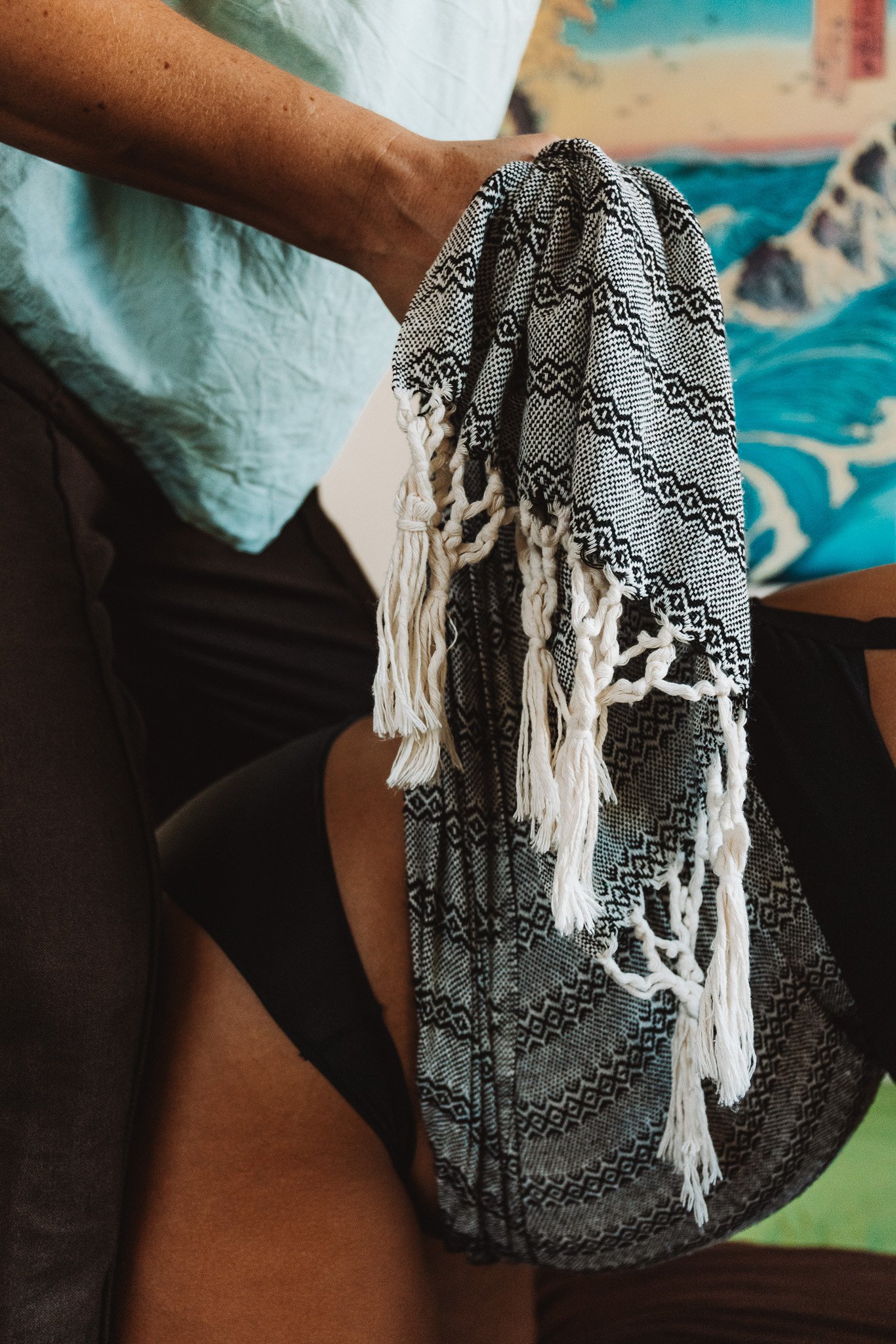 Midwife practicing Rebozo with pregnant woman